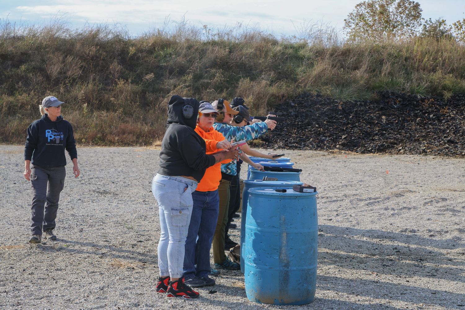 Amy Hess, left, watches over her students during a concealed carry class