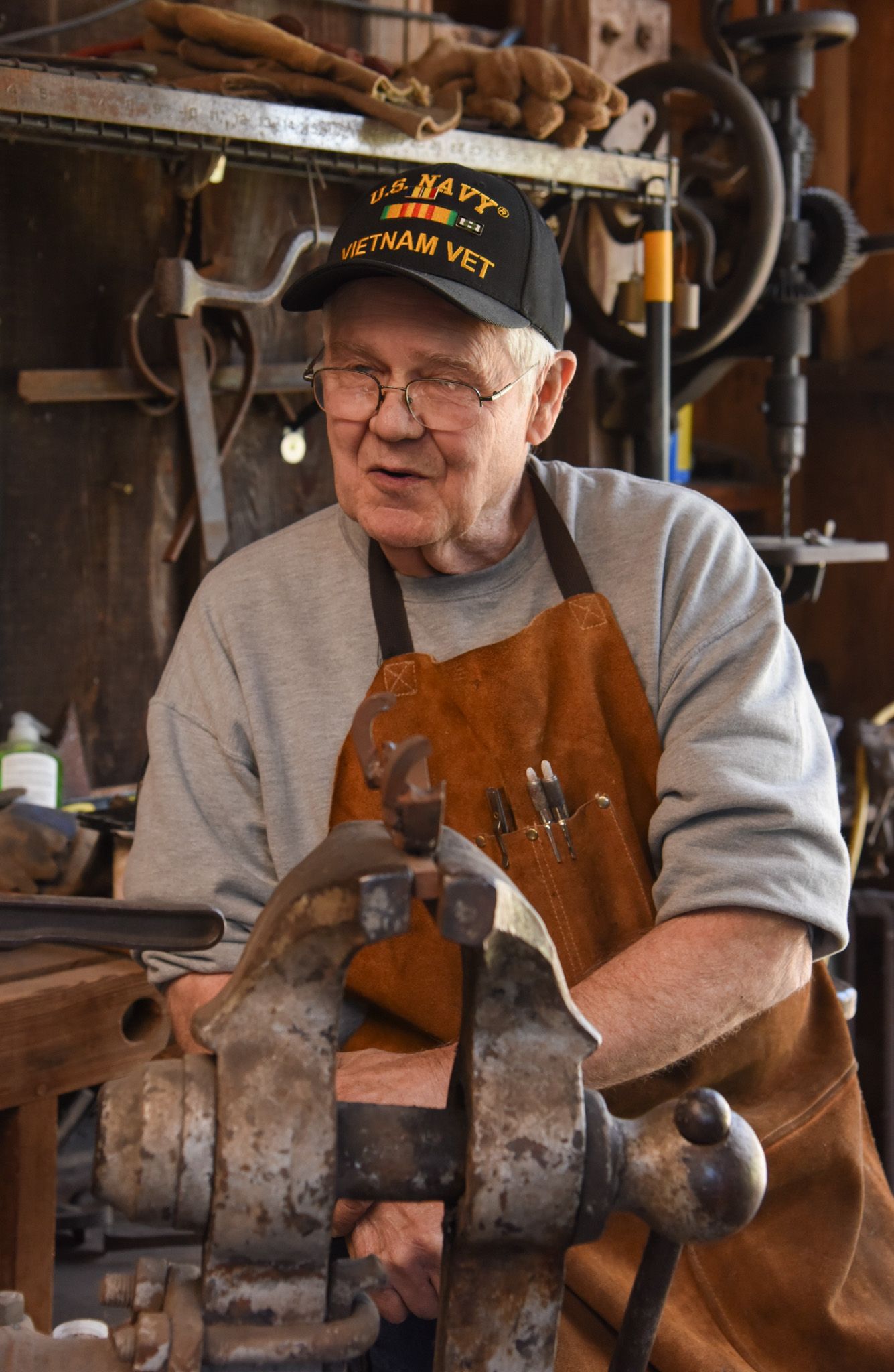 George B. Robb II watches Bradley Whittington work