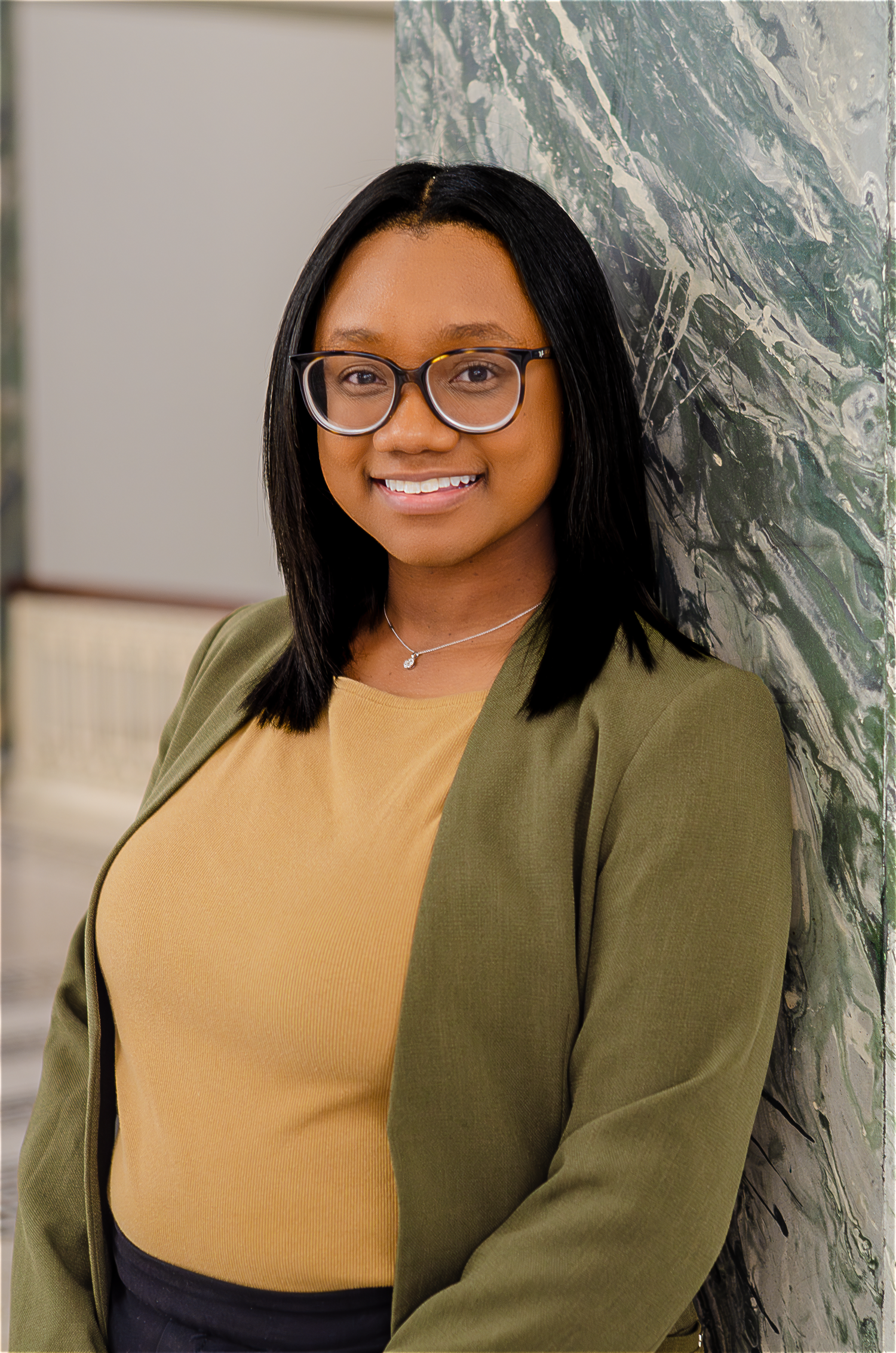 Professional headshots against a marble background. Photos by KM Conceptions Photography.