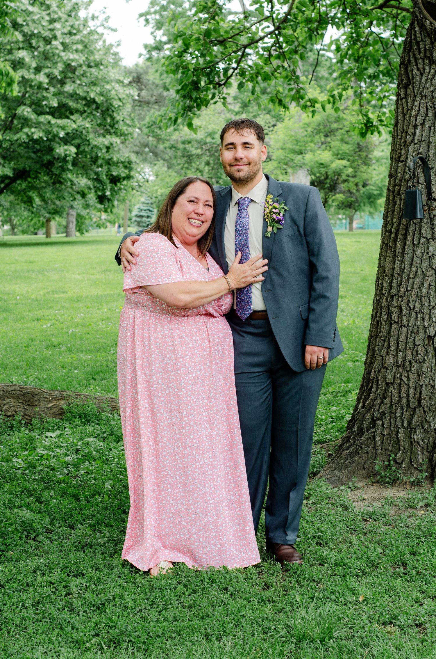 Mom and son together for son's wedding. Wedding photos by KM Conceptions Photography.