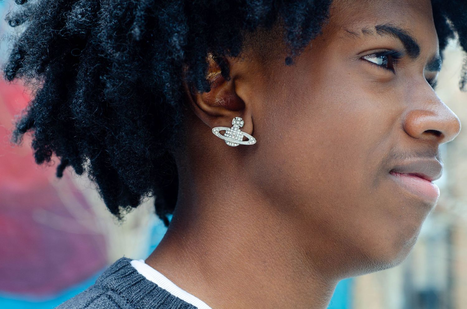 Profile shots showing natural curly hair against a colorful background.