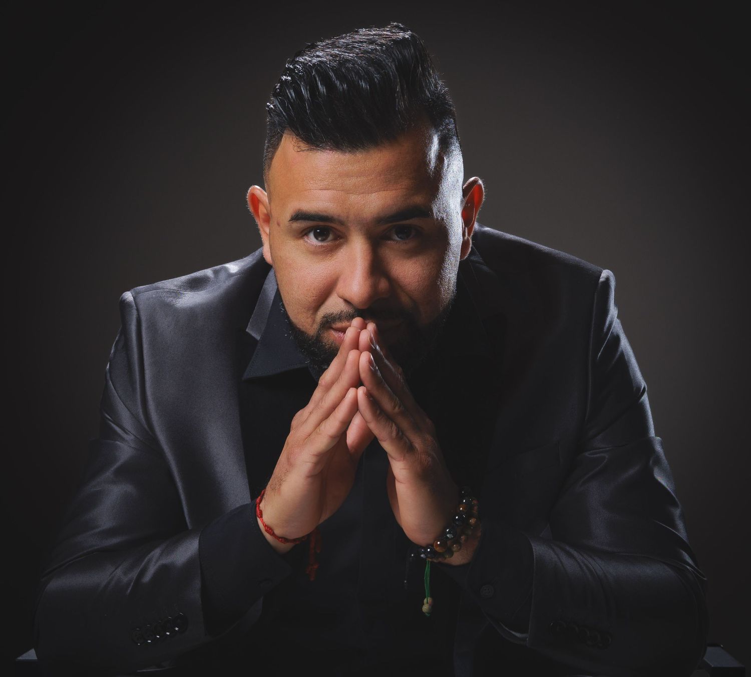 A bold and powerful male executive portrait with dramatic lighting. Luxury branding photography session in Houston for entrepreneurs