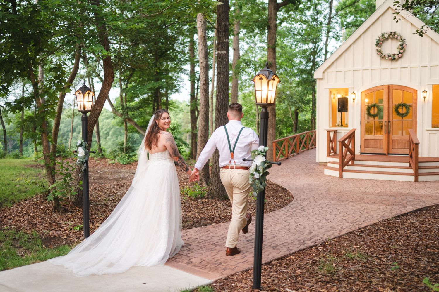 A romantic wedding photo series showing couples in an enchanting outdoor wooded venue with rustic chapel setting.
