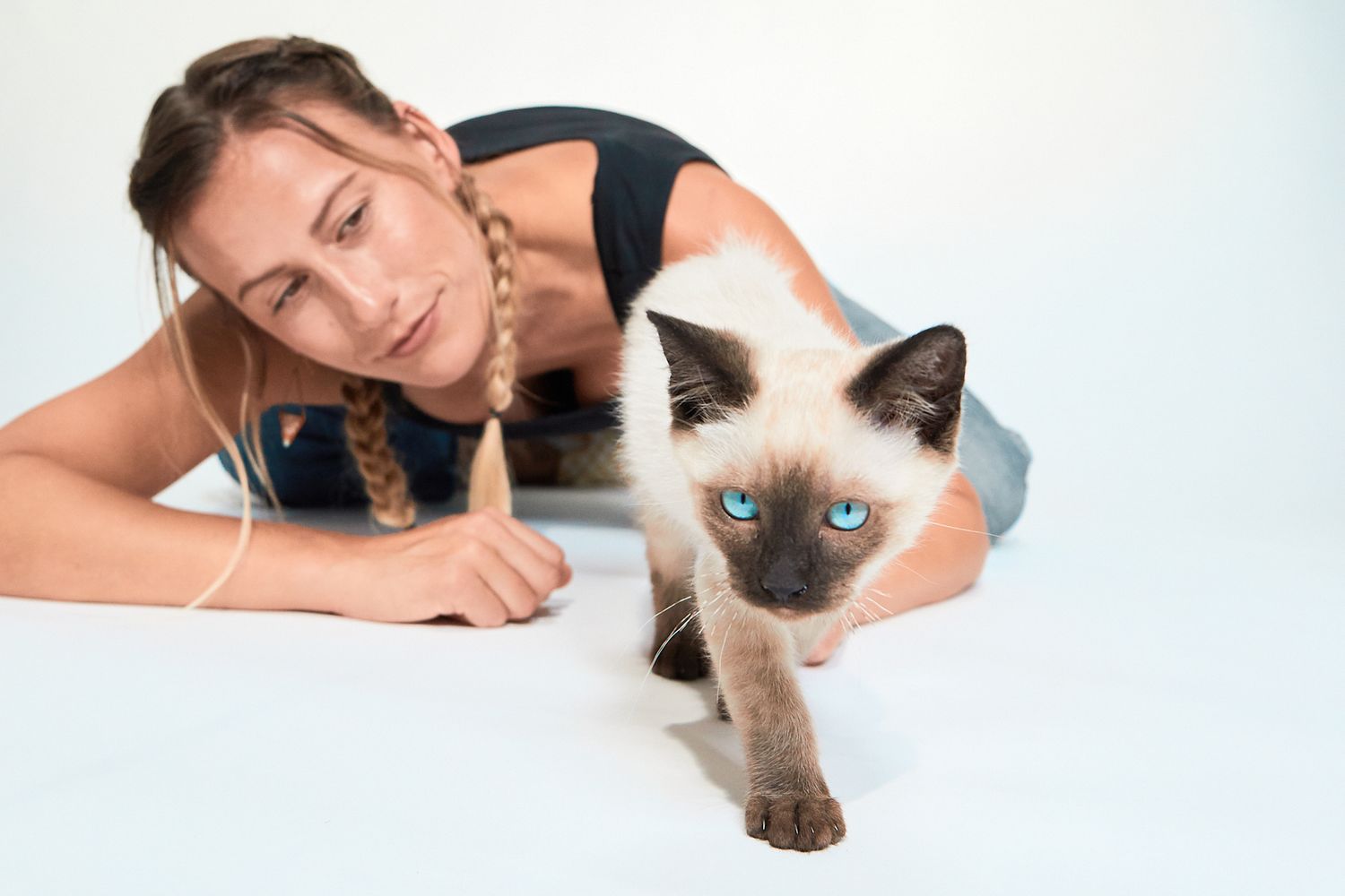 Modern pet photography with woman and cat