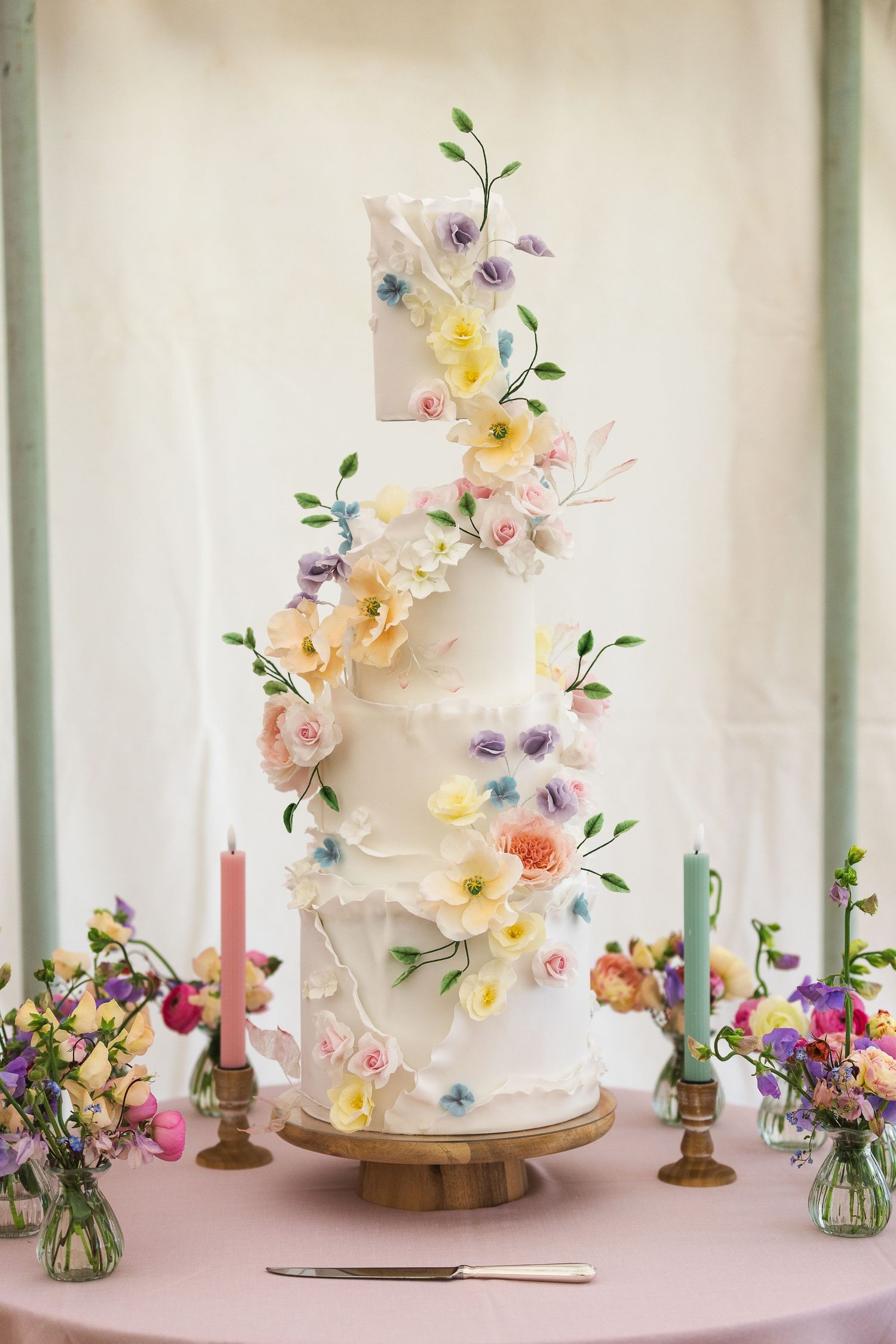 Wedding cake with pastel flowers