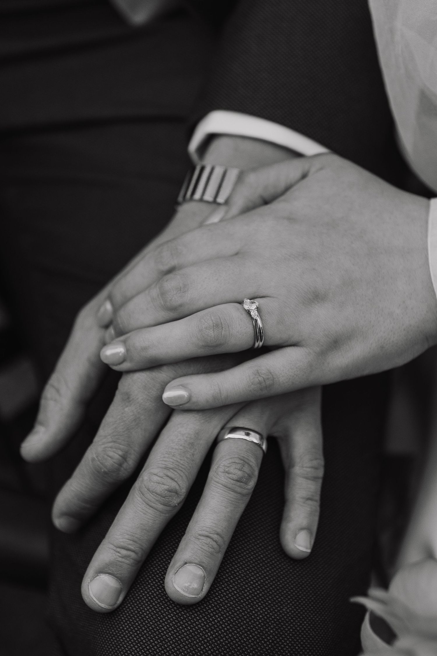 couple with their new additions - the wedding rings - black and white