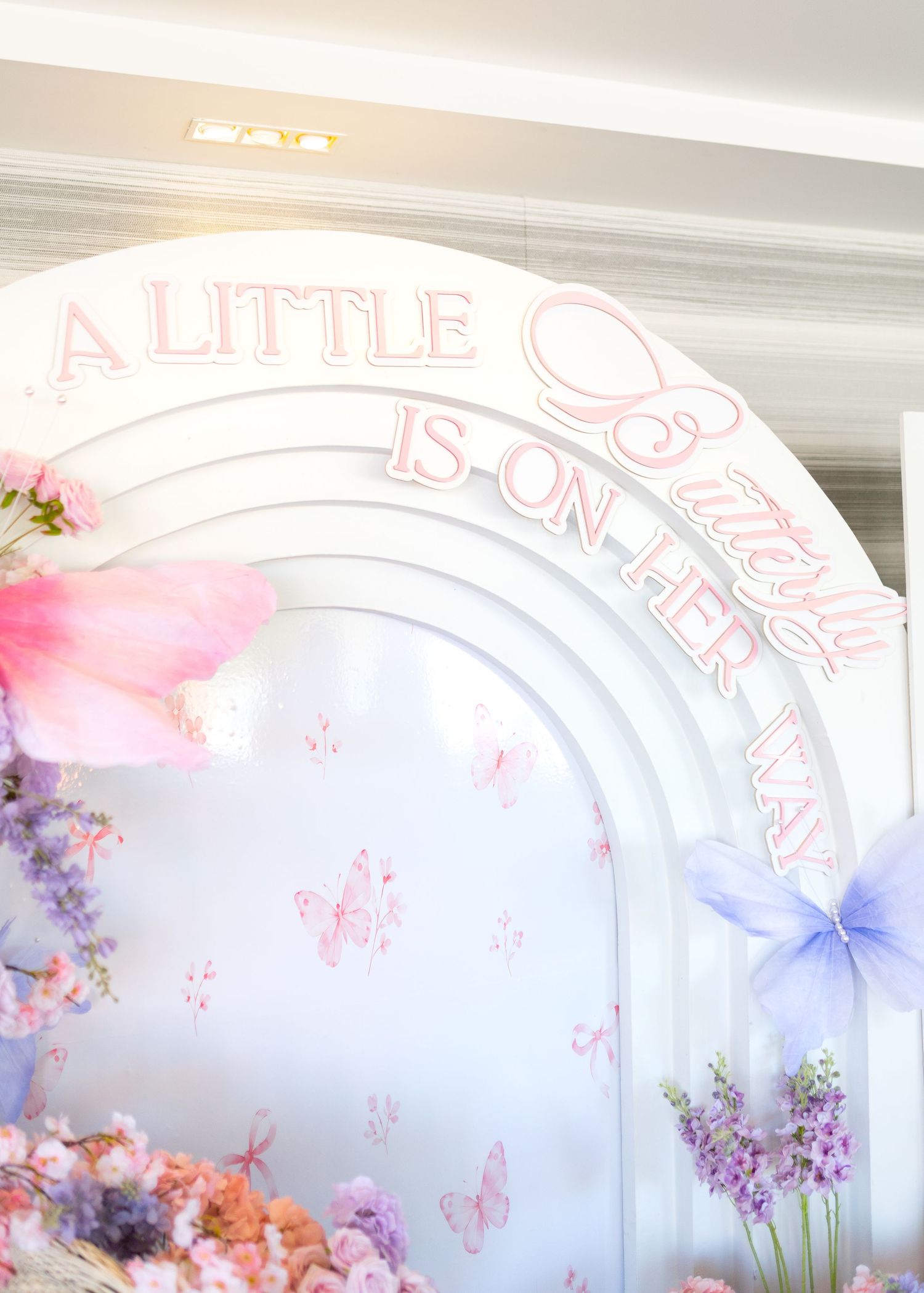 A little butterfly is on the way backdrop for a baby shower at Harbor Club at Prime in Huntington New York. Backdrop by Styliani Events.