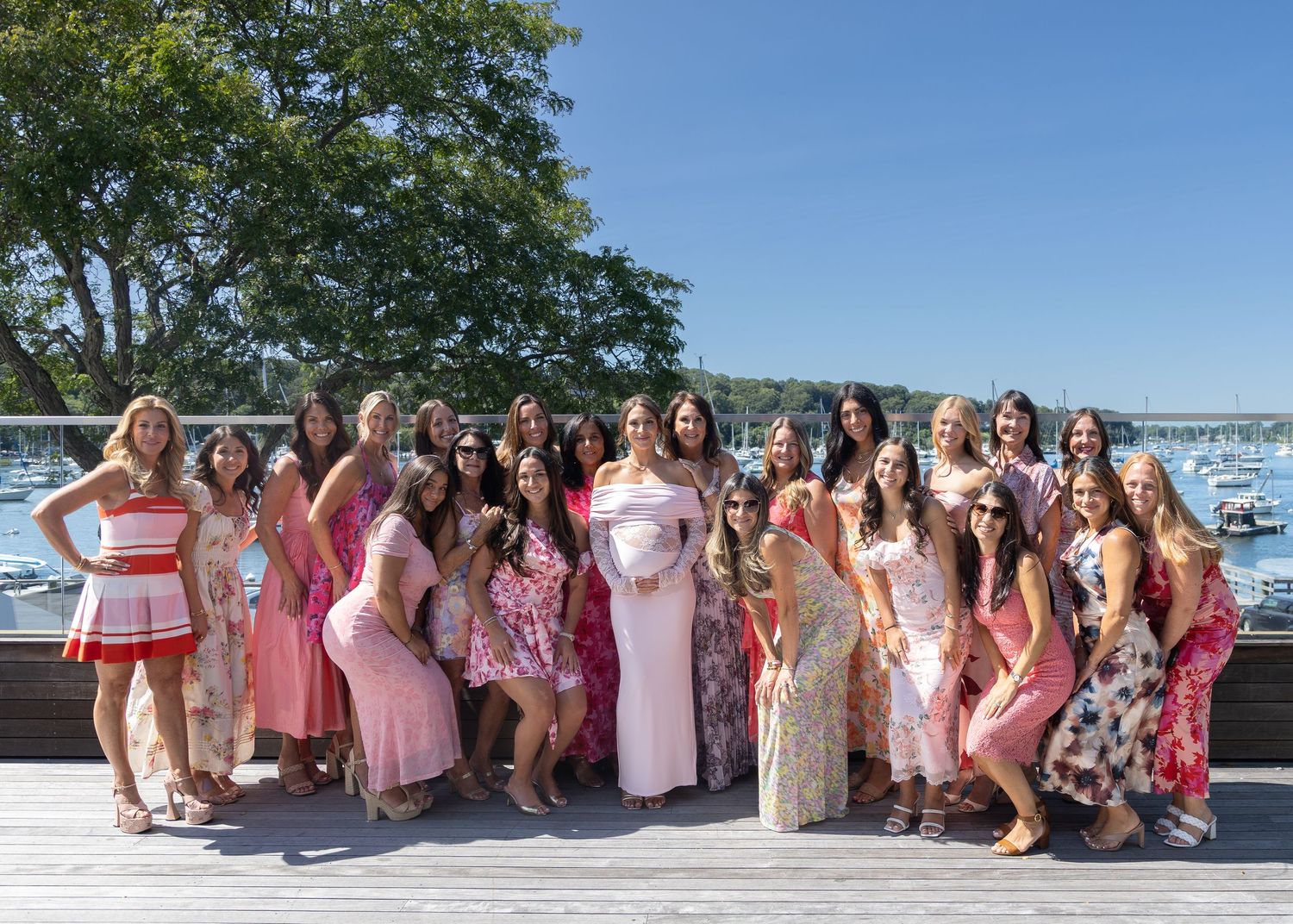 Mom-to-be with all of her guests wearing pink at her baby shower at Harbor Club at Prime in Huntington