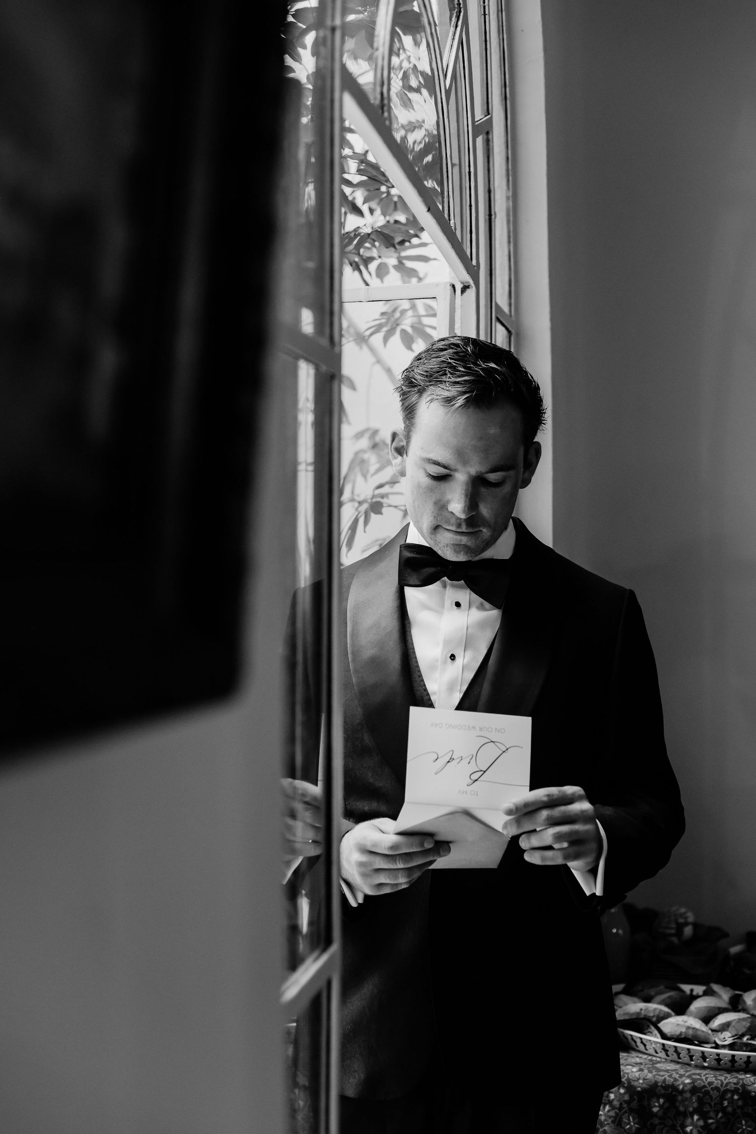 Groom getting ready for beach ceremony in Sayulita, Mexico