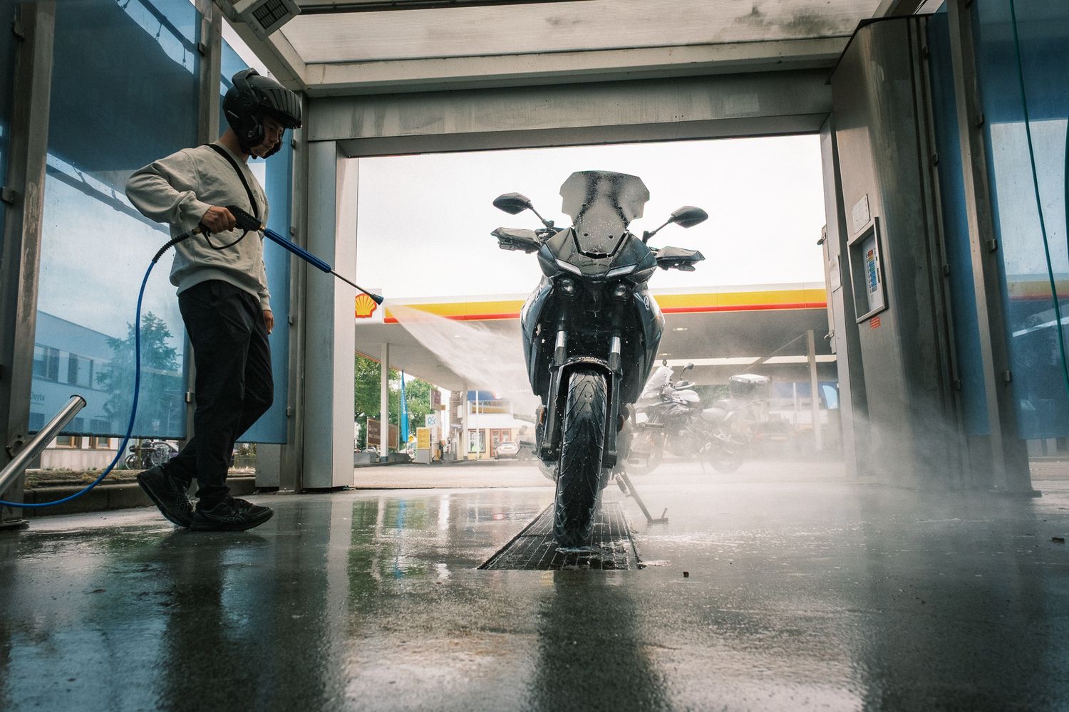 CFMOTO motorcycle photographed in Amsterdam with cinematic urban lighting and detailed composition.