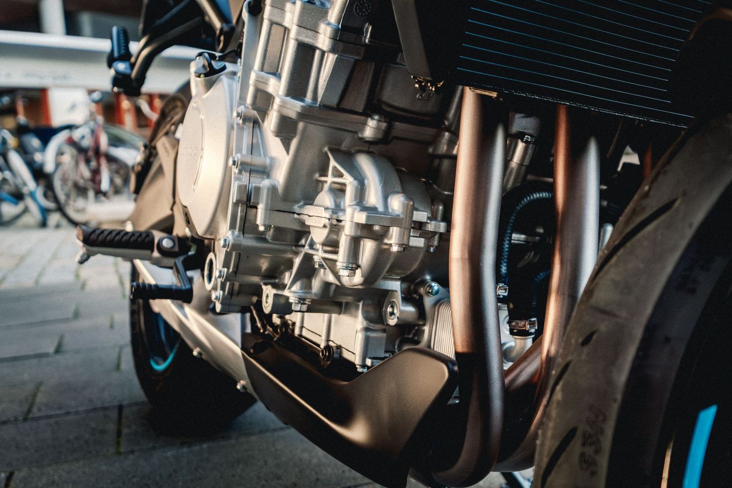 CFMOTO motorcycle photographed in Amsterdam with cinematic urban lighting and detailed composition.