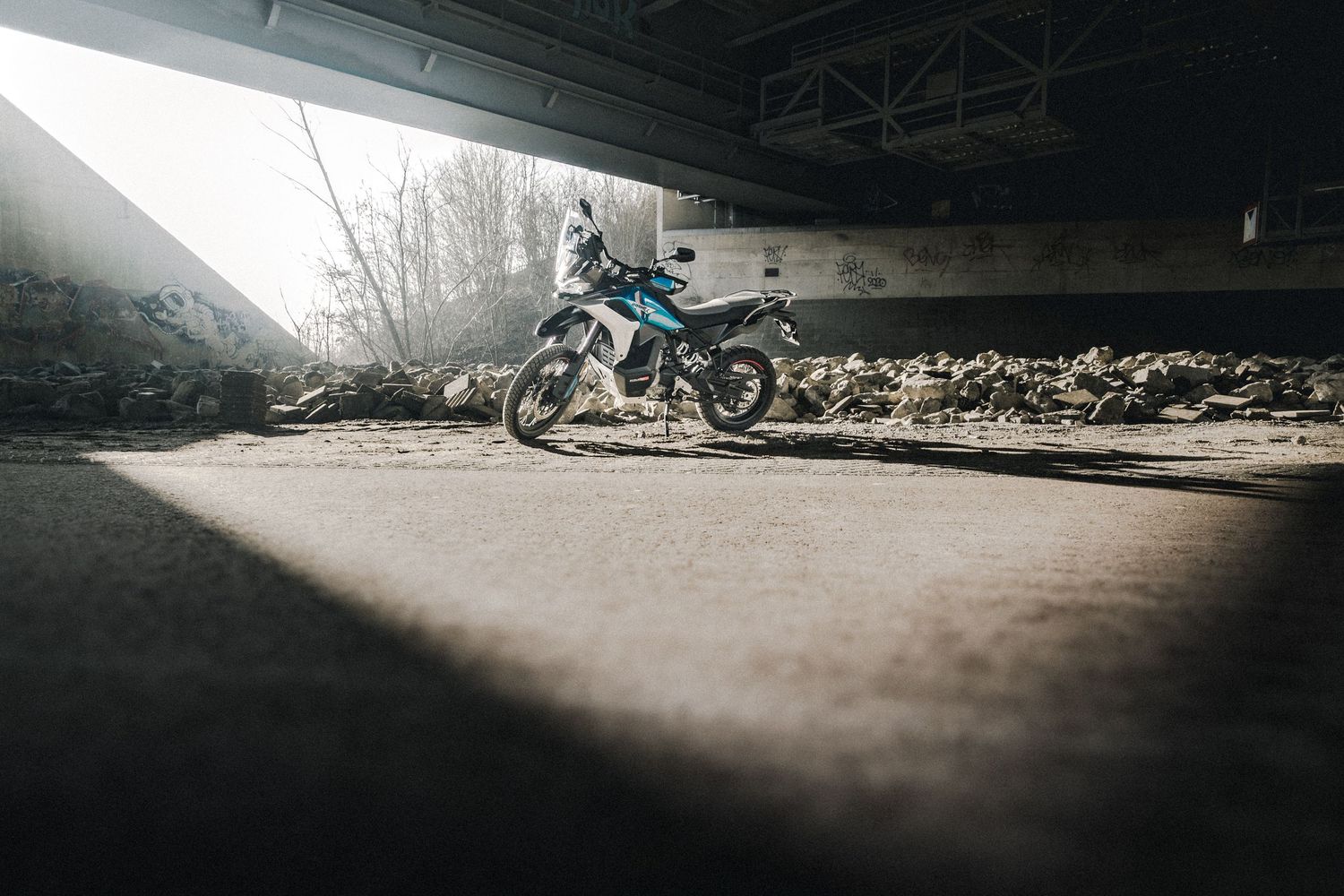 CFMOTO motorcycle photographed in Amsterdam with cinematic urban lighting and detailed composition.