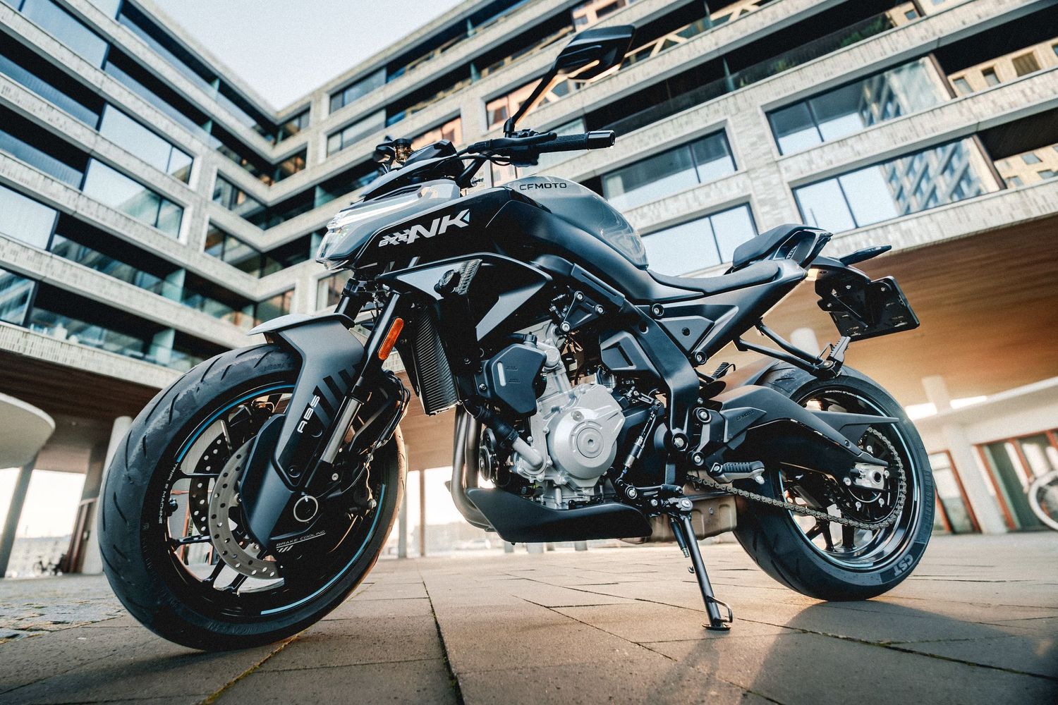 CFMOTO motorcycle photographed in Amsterdam with cinematic urban lighting and detailed composition.