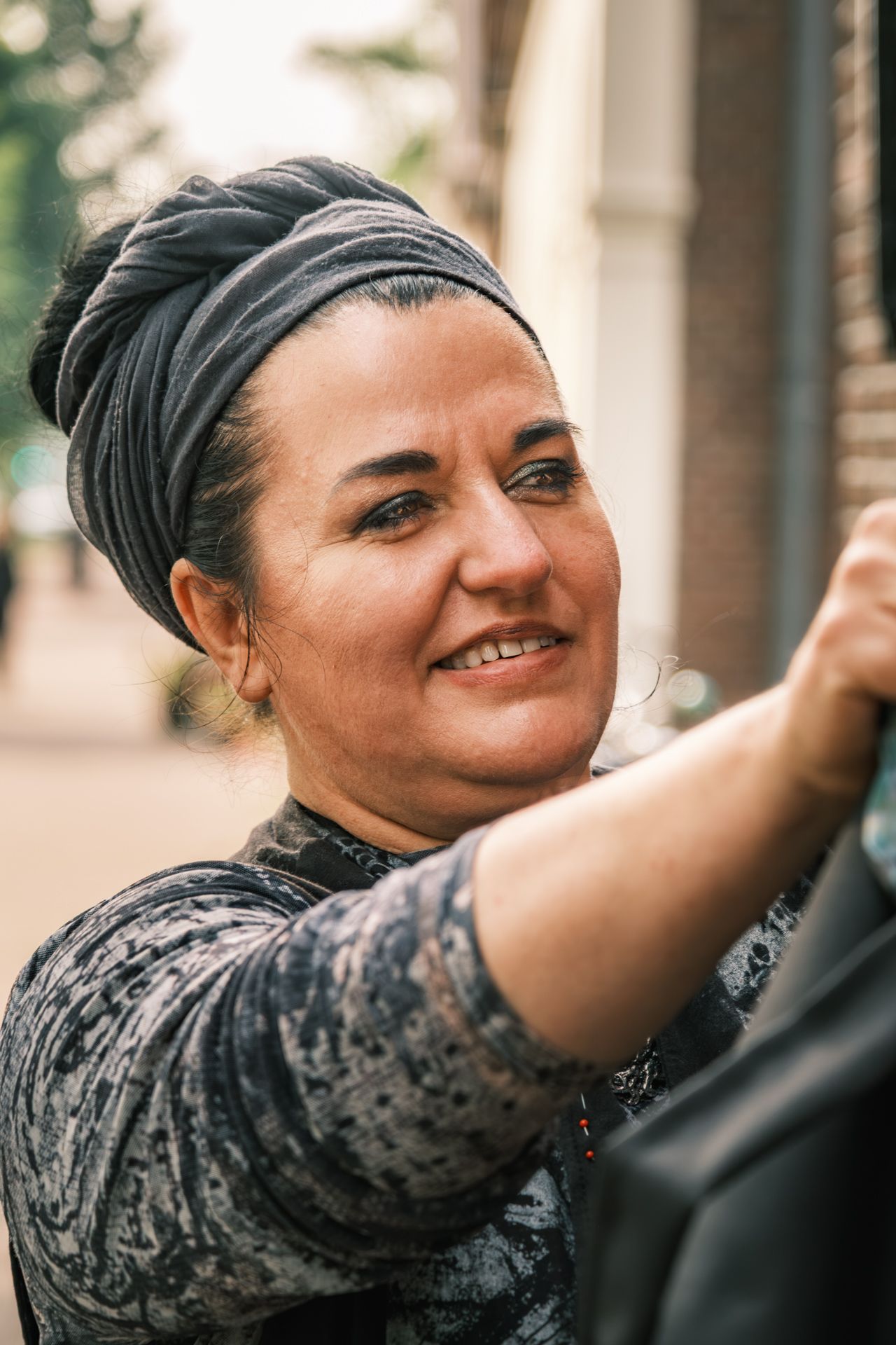 Street portrait photography in Amsterdam capturing a natural and authentic expression.