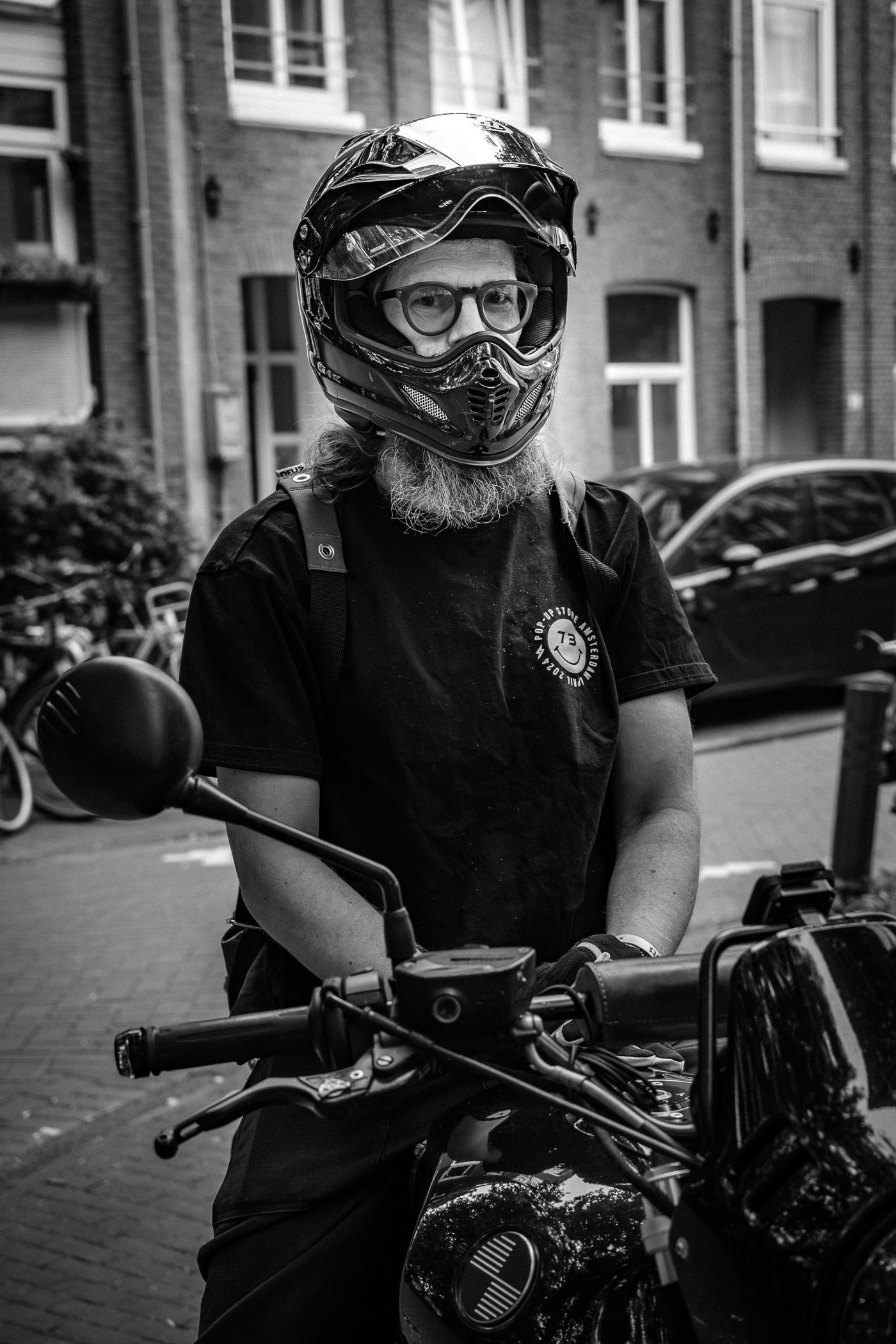 Street portrait photography in Amsterdam capturing a natural and authentic expression.