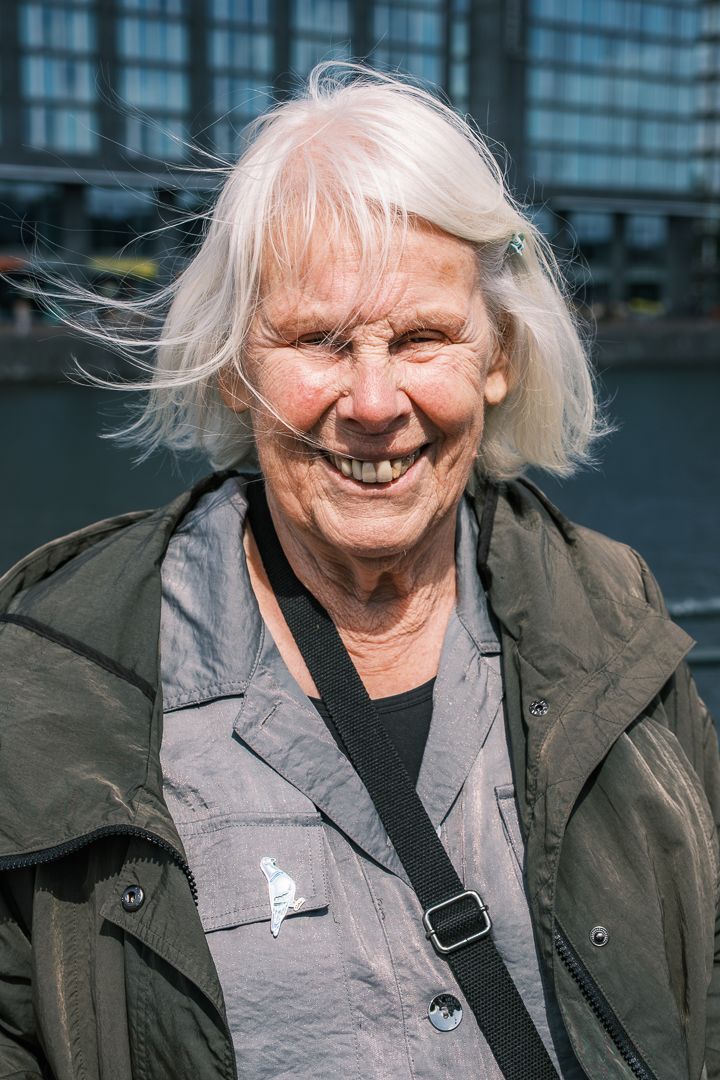 Street portrait photography in Amsterdam capturing a natural and authentic expression.