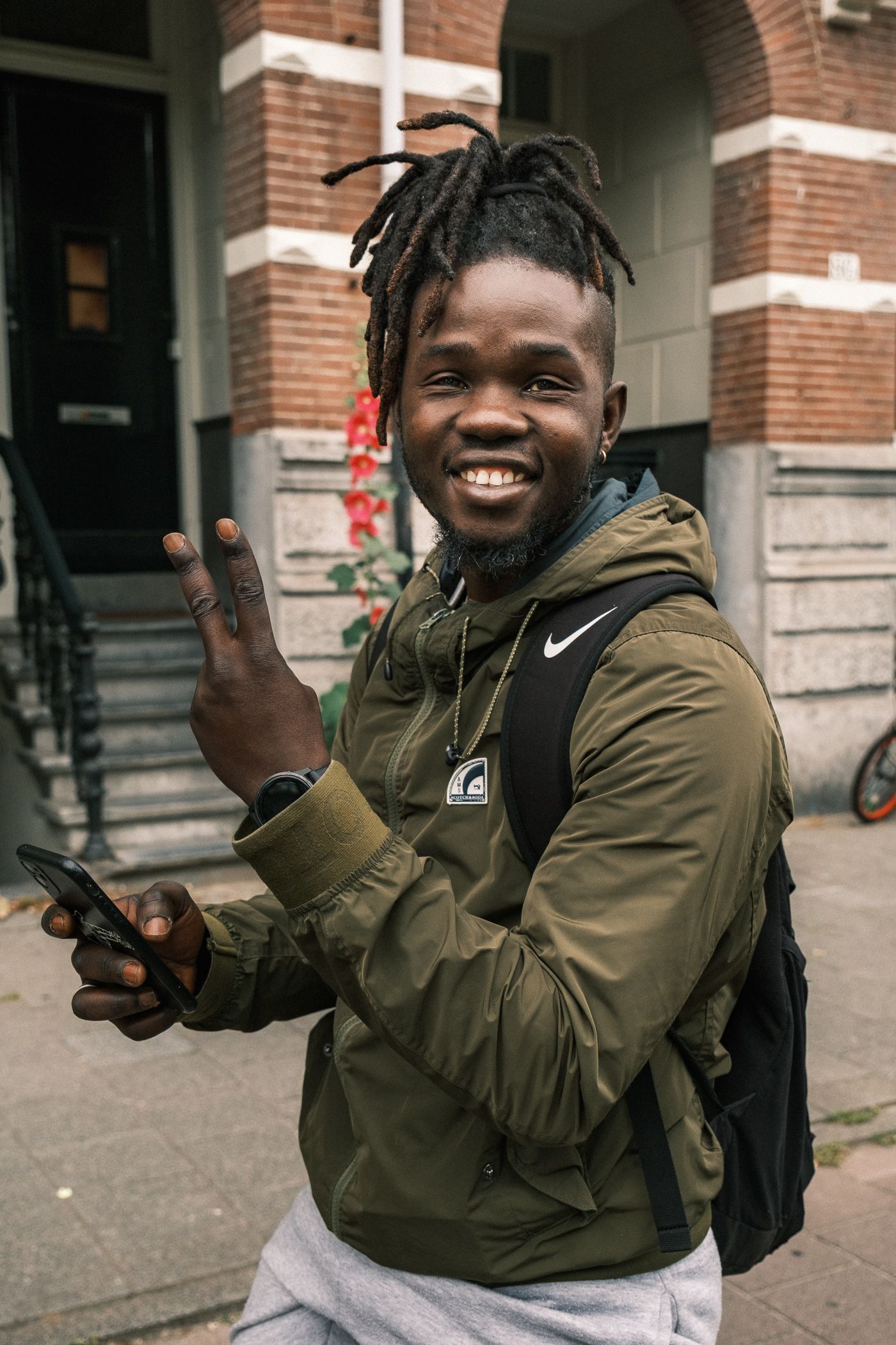 Street portrait photography in Amsterdam capturing a natural and authentic expression.
