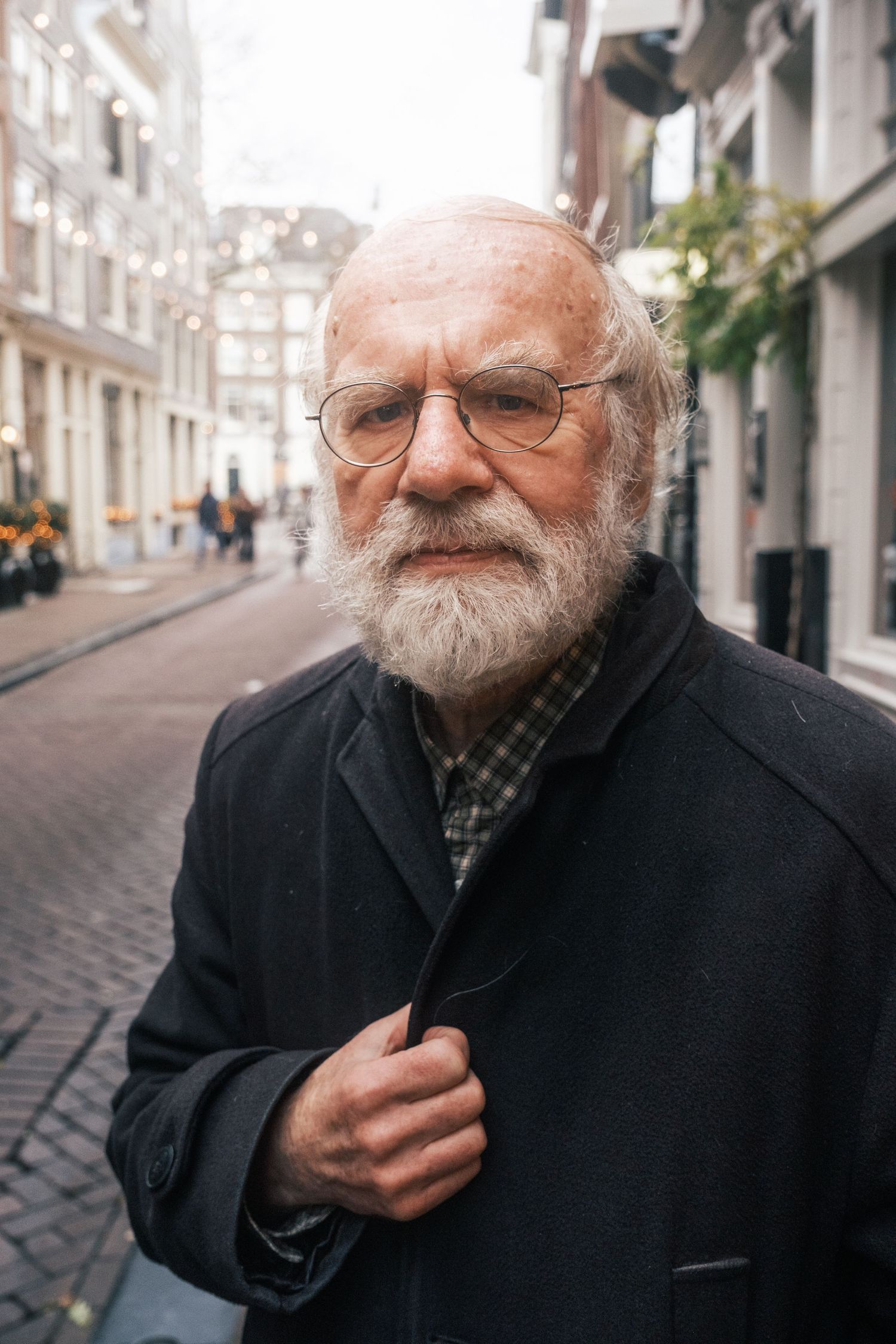 Street portrait photography in Amsterdam capturing a natural and authentic expression.