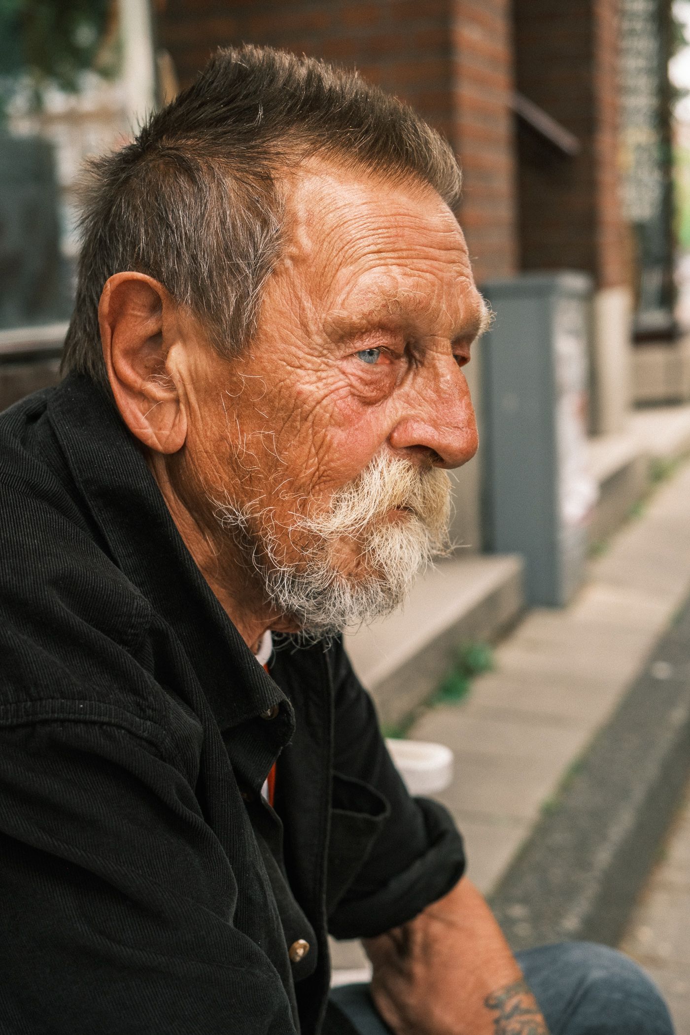 Street portrait photography in Amsterdam capturing a natural and authentic expression.