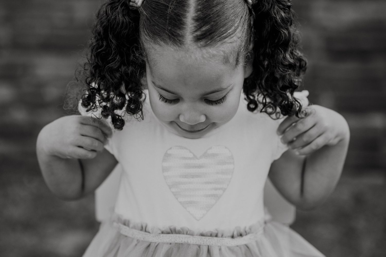Black and white portrait showing playful expressions.