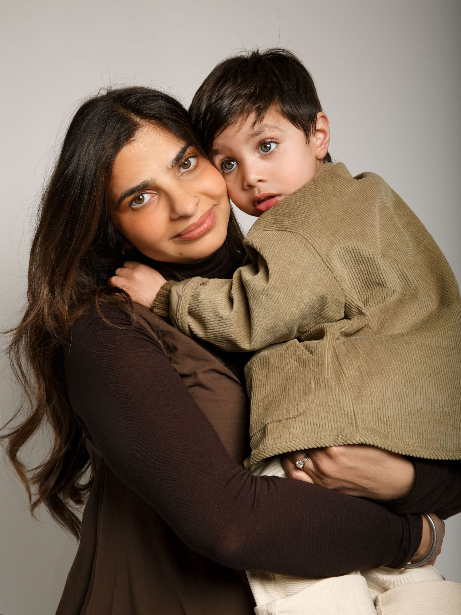 Studio maternity photography using softbox lighting for a natural look