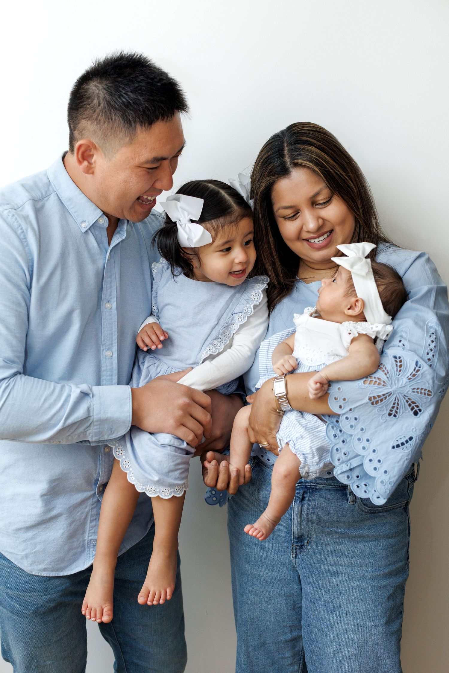 Calm studio newborn photography with soft textures