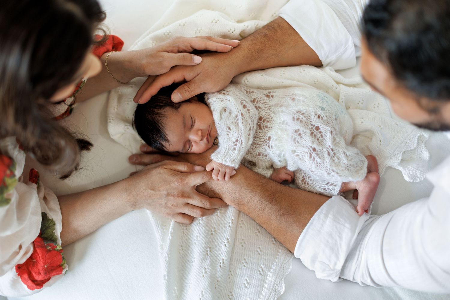 Natural newborn photography featuring a baby in a minimal setup