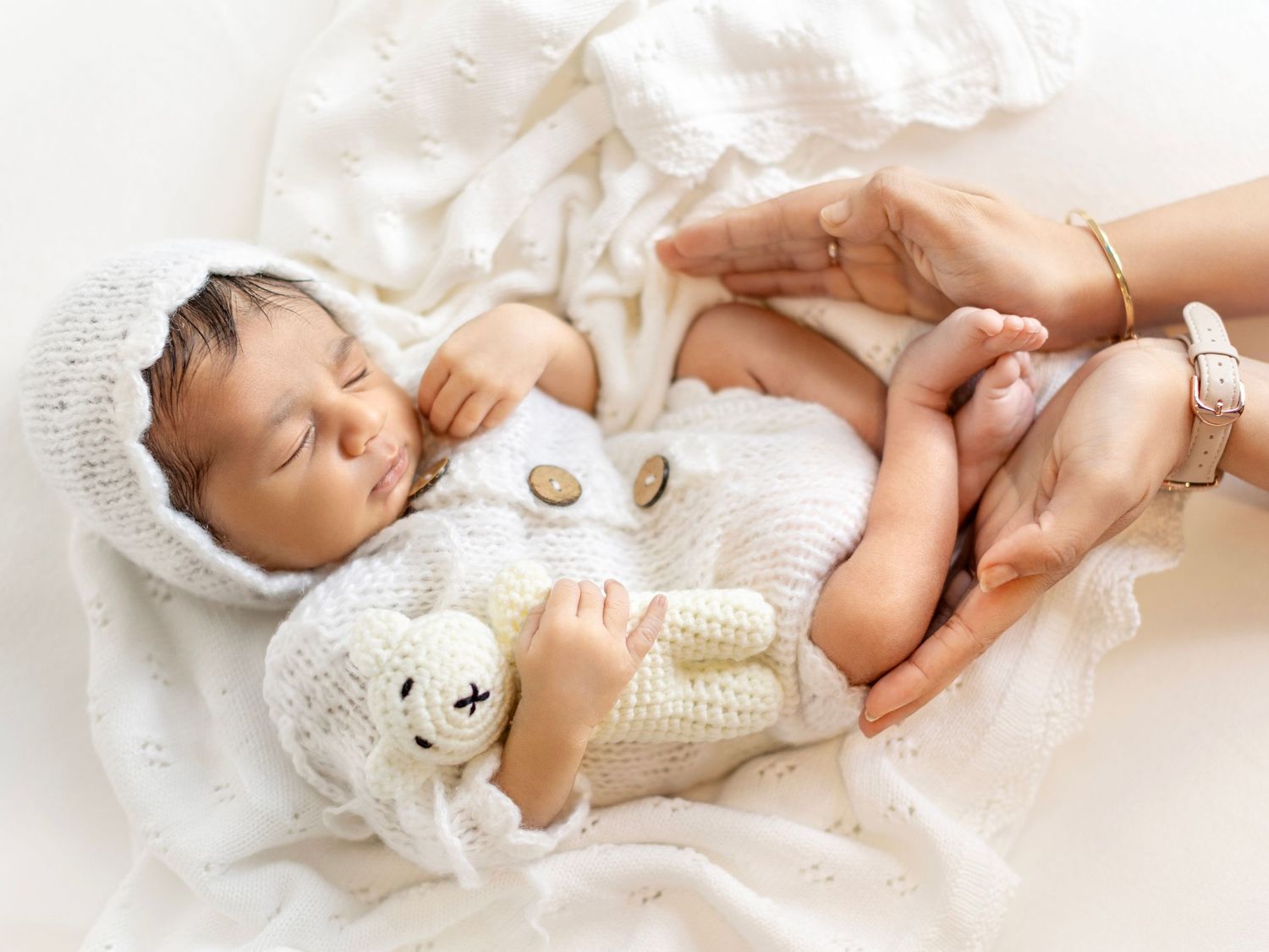 Gentle newborn photoshoot focused on baby comfort