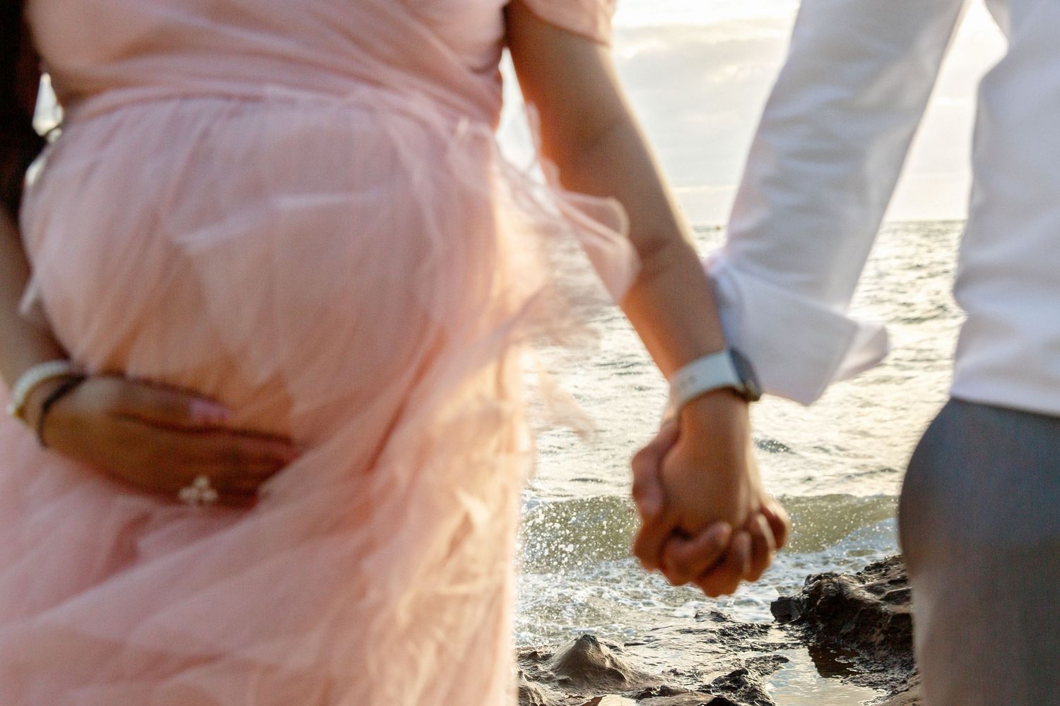Elegant maternity photoshoot with natural movement and light