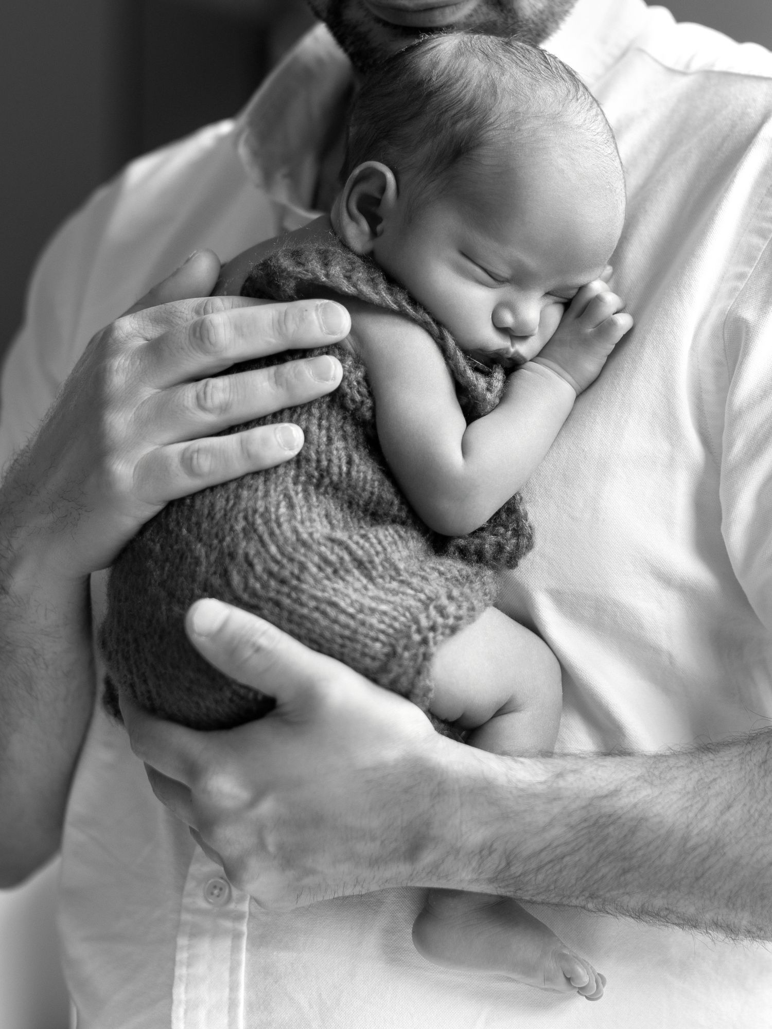 Gentle newborn photography session with soft natural light