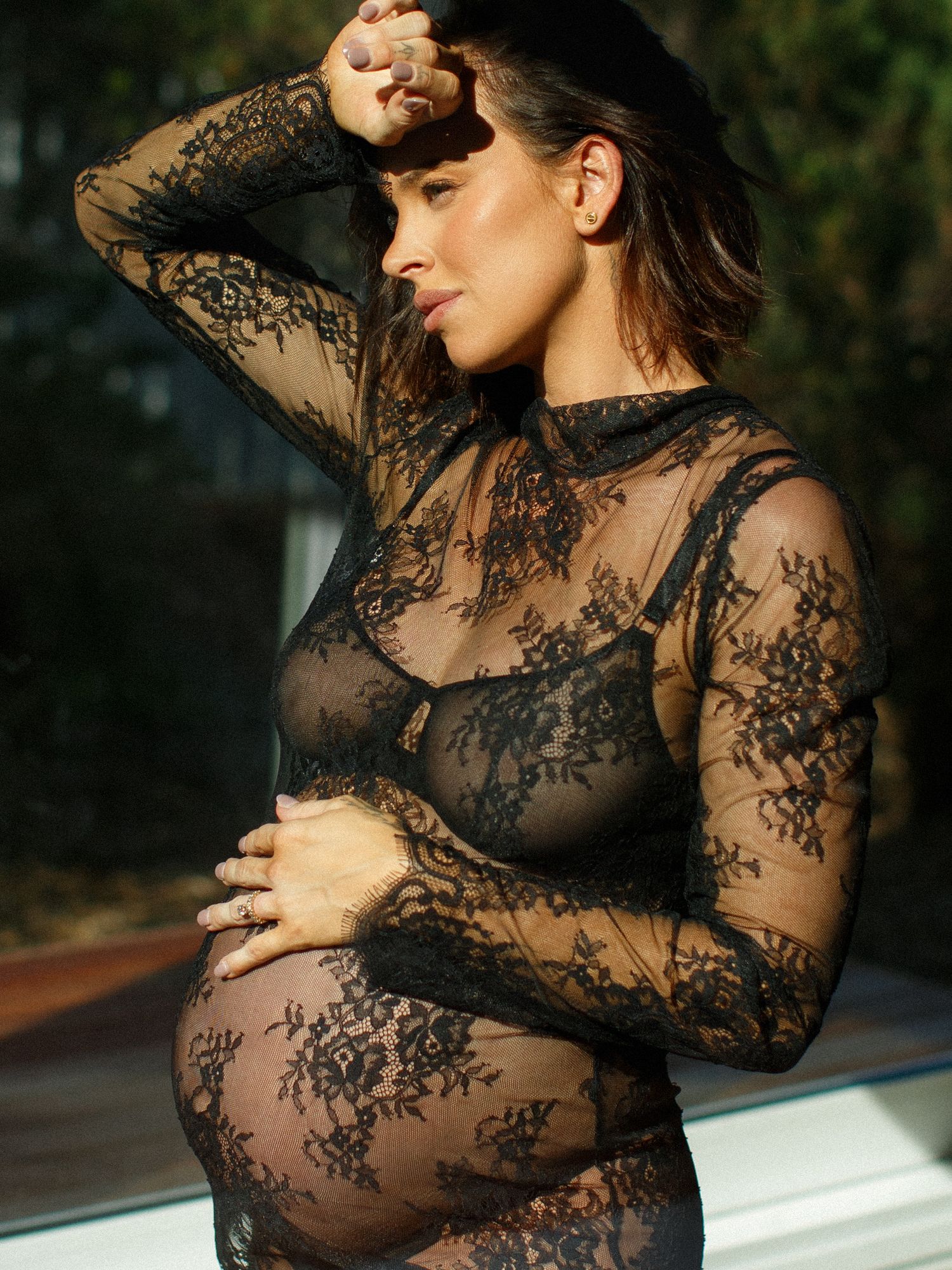 Pregnancy photography session with soft textures and light