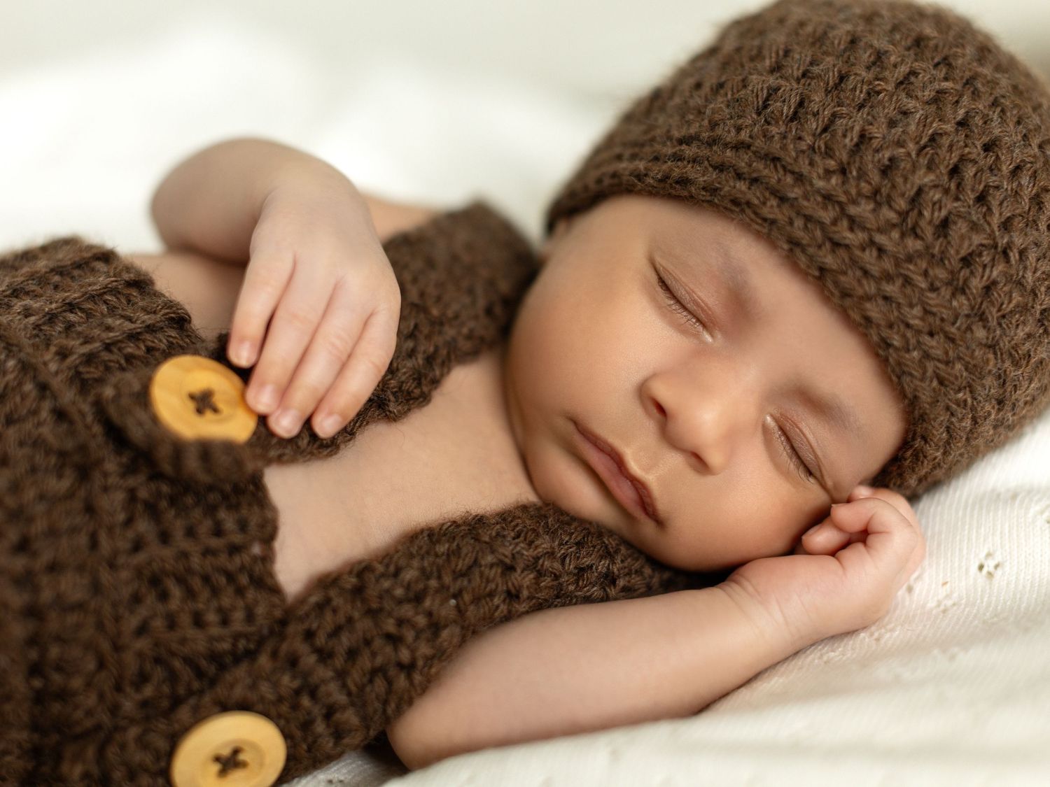 Studio newborn photography with a minimal, clean setup