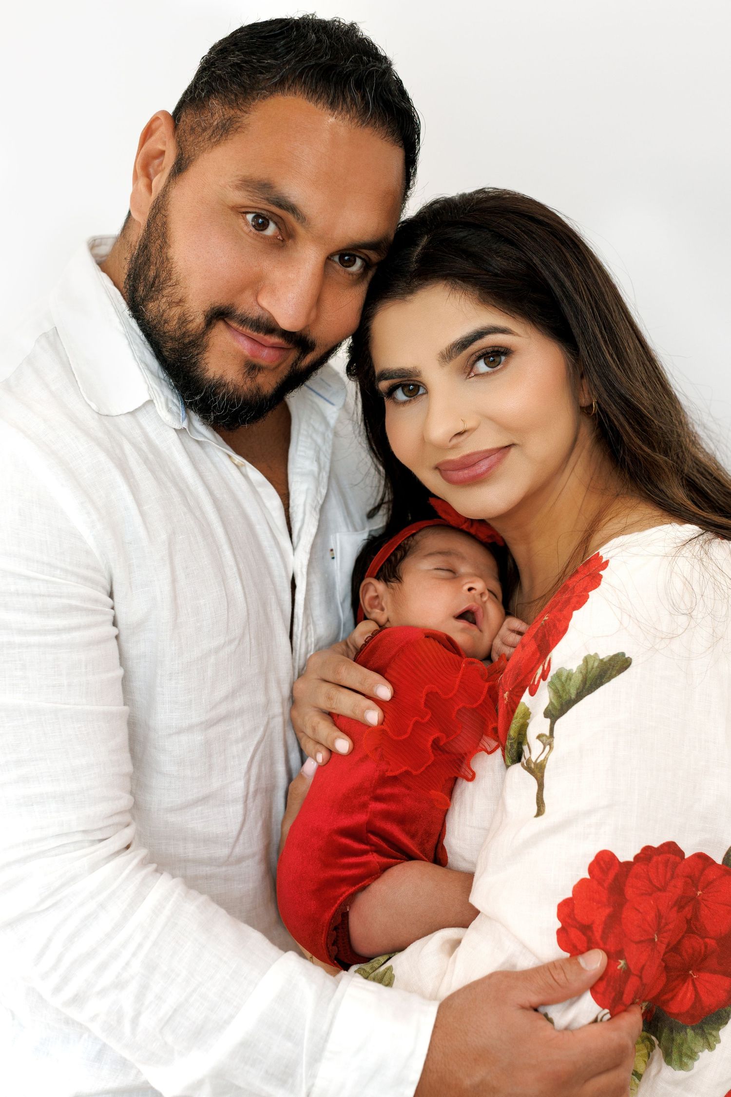 Newborn photography session highlighting tiny details and soft textures