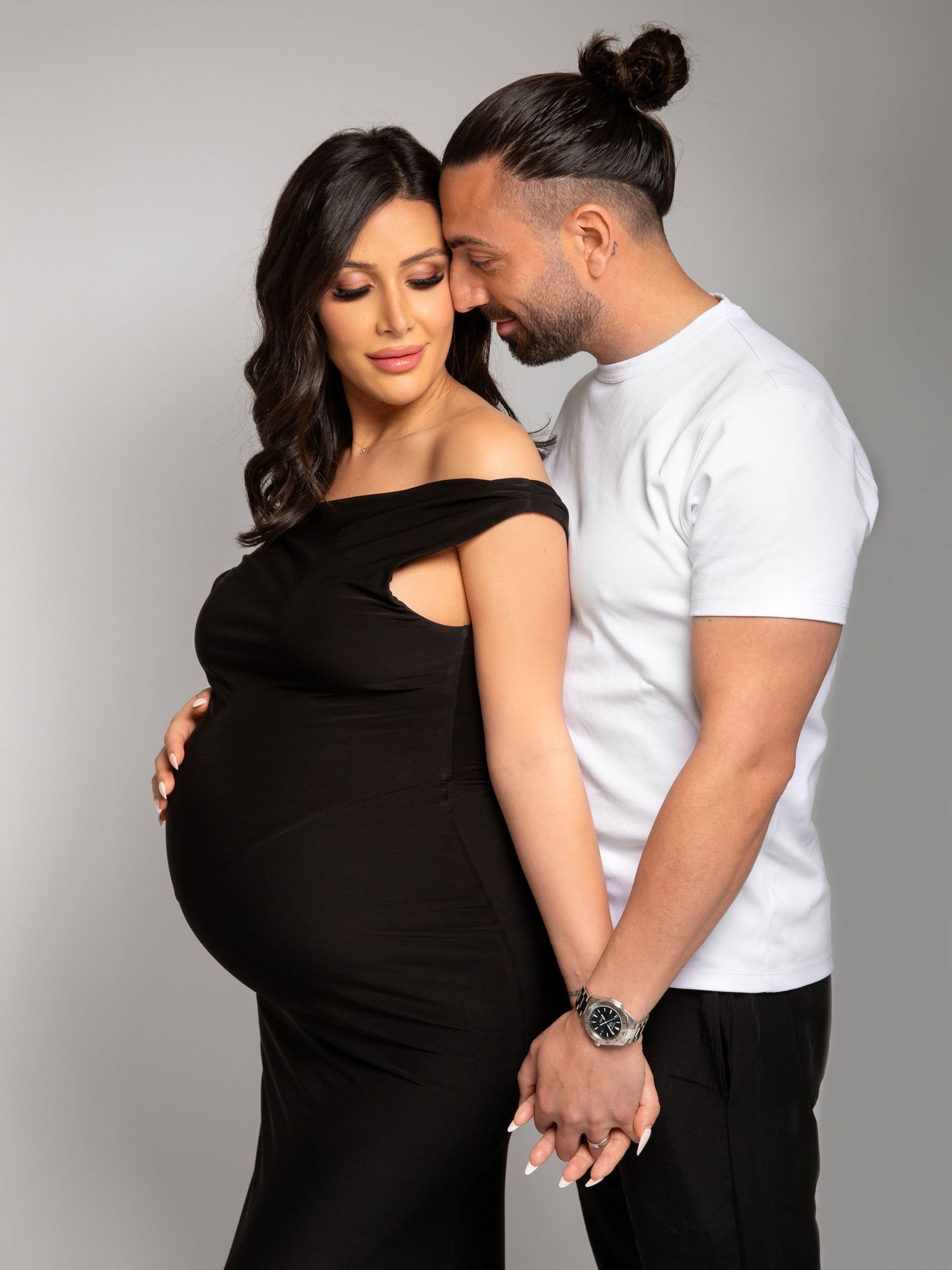 Studio maternity photography capturing pregnancy in a calm setting
