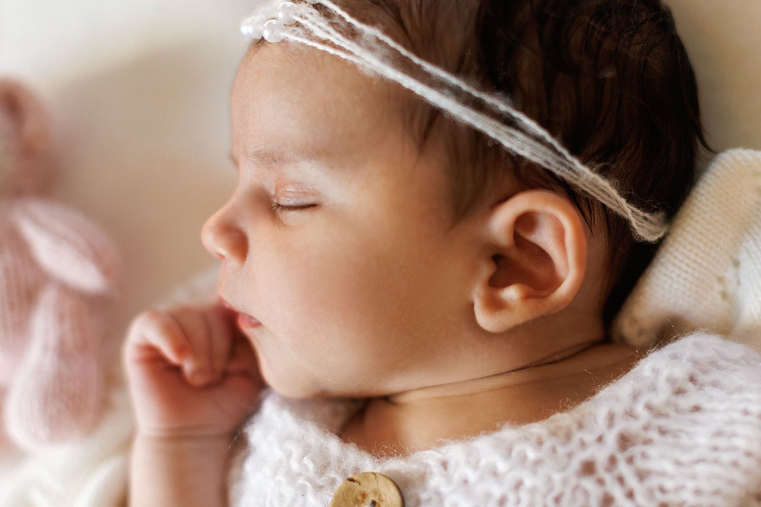 Newborn photography session in Melbourne featuring a sleeping baby