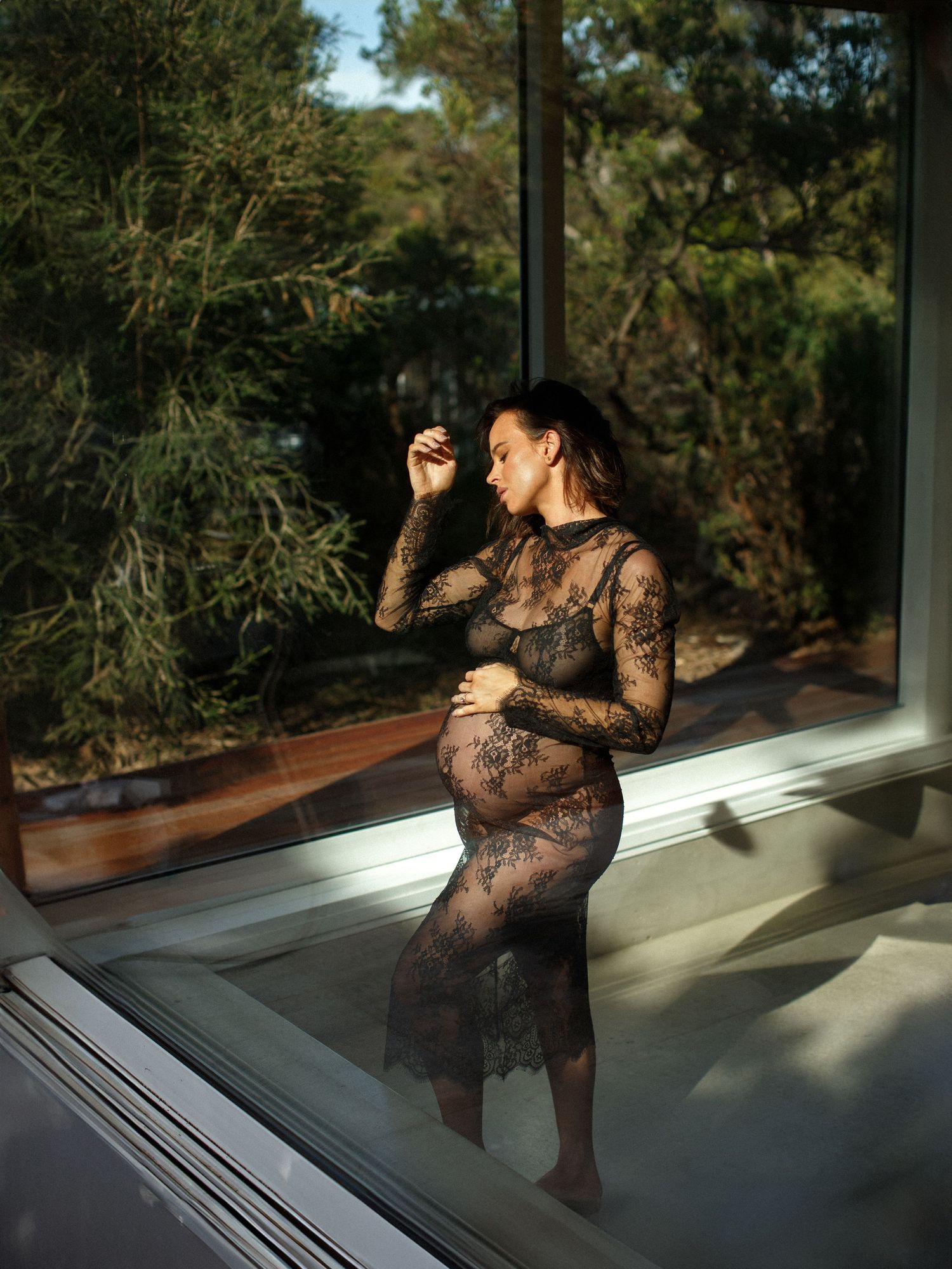 Maternity portrait photographed with a calm, elegant mood