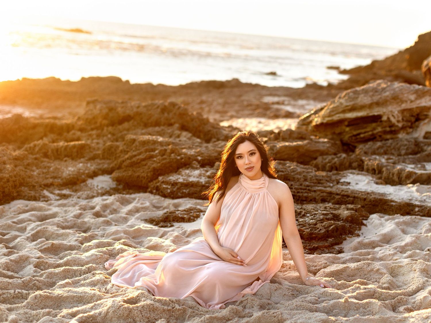 Maternity portrait photographed with a calm, elegant mood