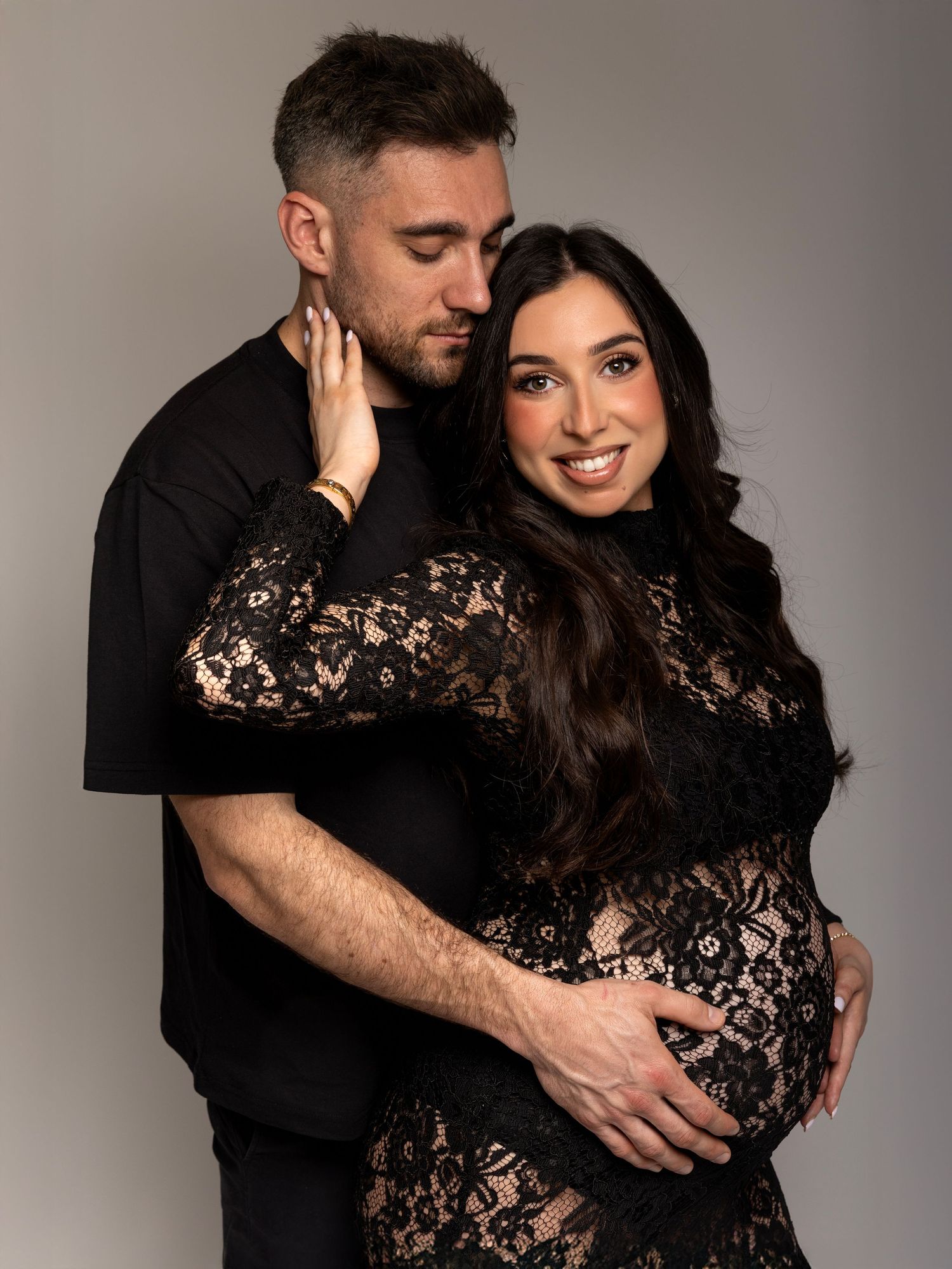 Pregnancy photoshoot captured with natural-style studio lighting