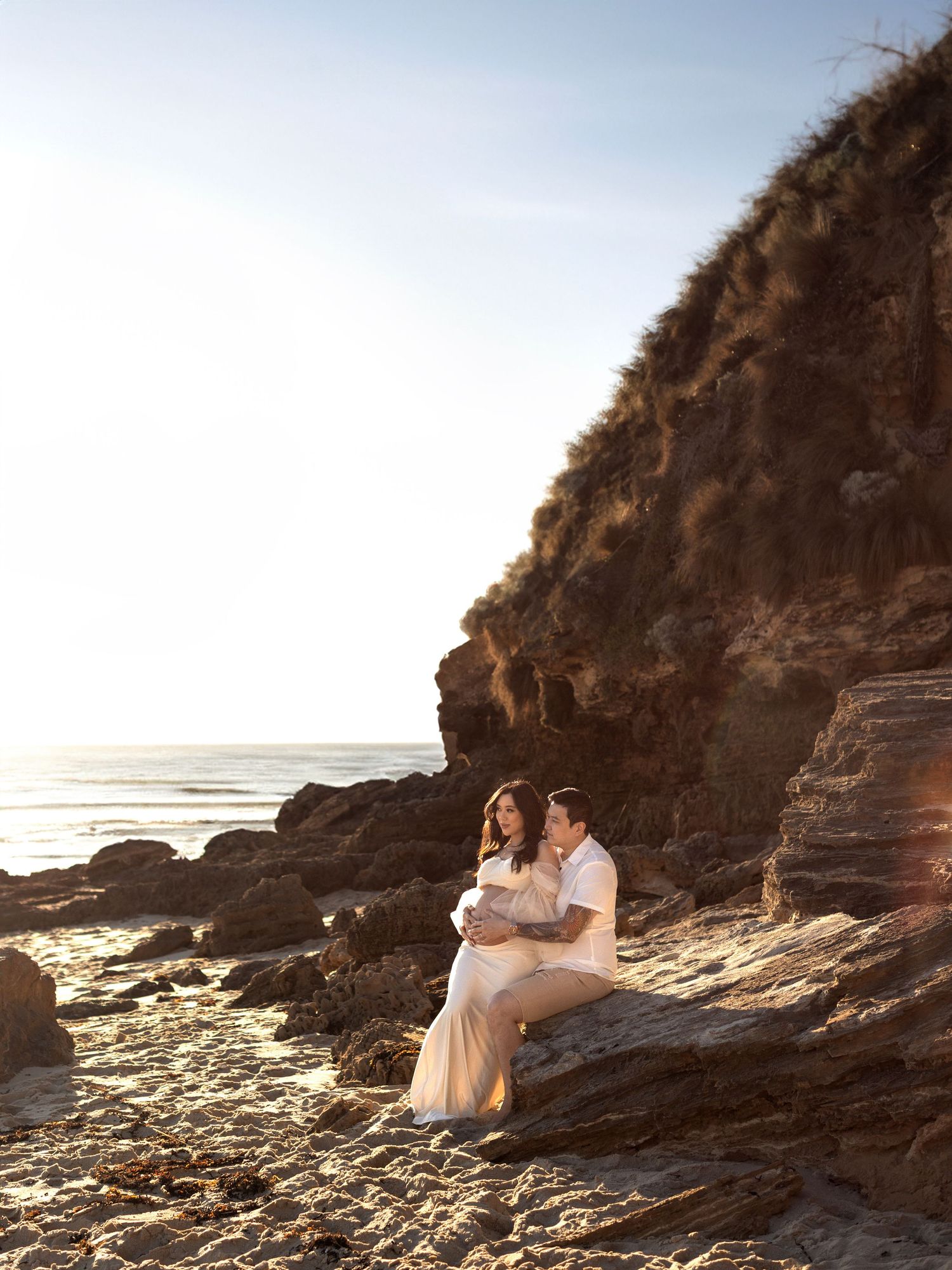 Maternity portrait photographed in a soft, elegant style
