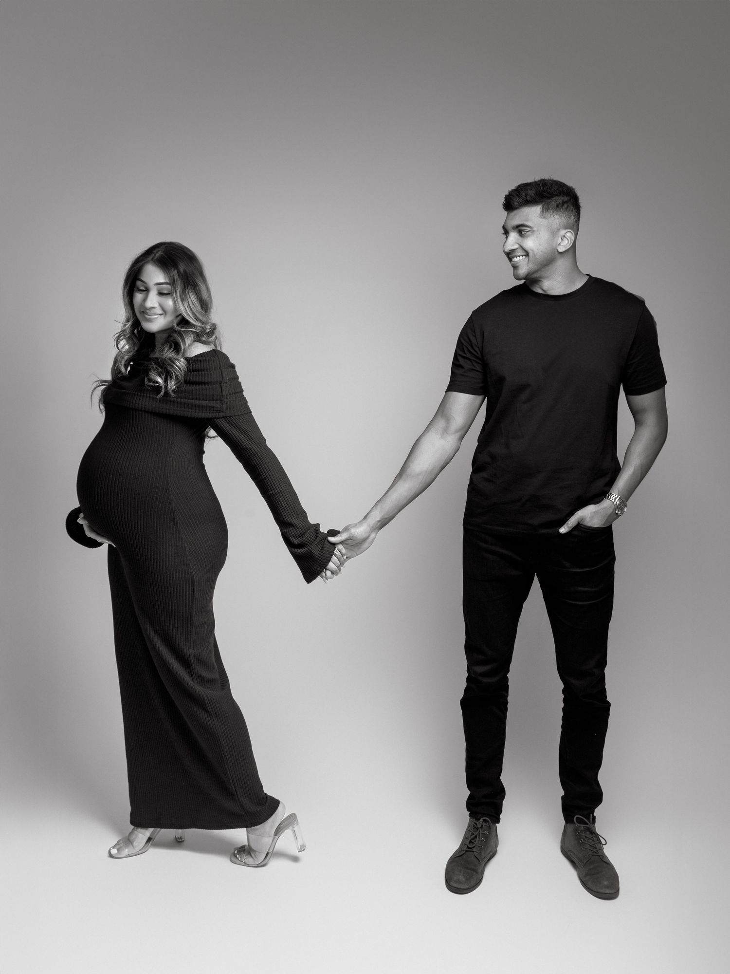 Maternity portrait photographed in studio with soft directional lighting