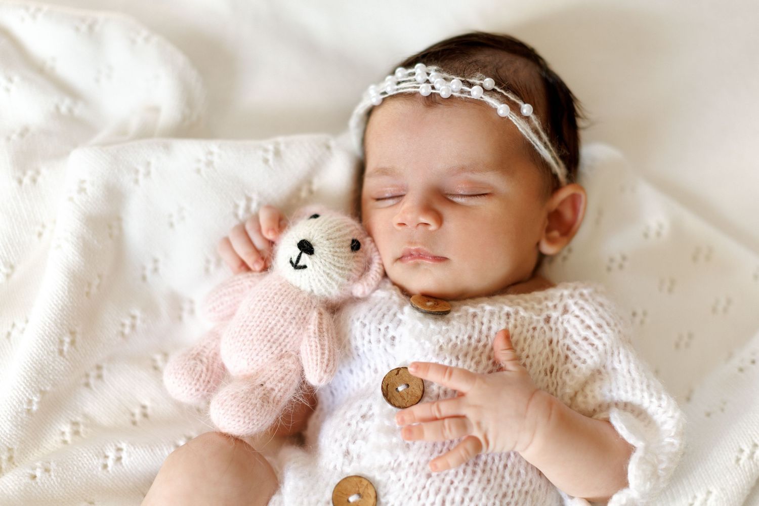 Studio newborn photography with a peaceful newborn baby