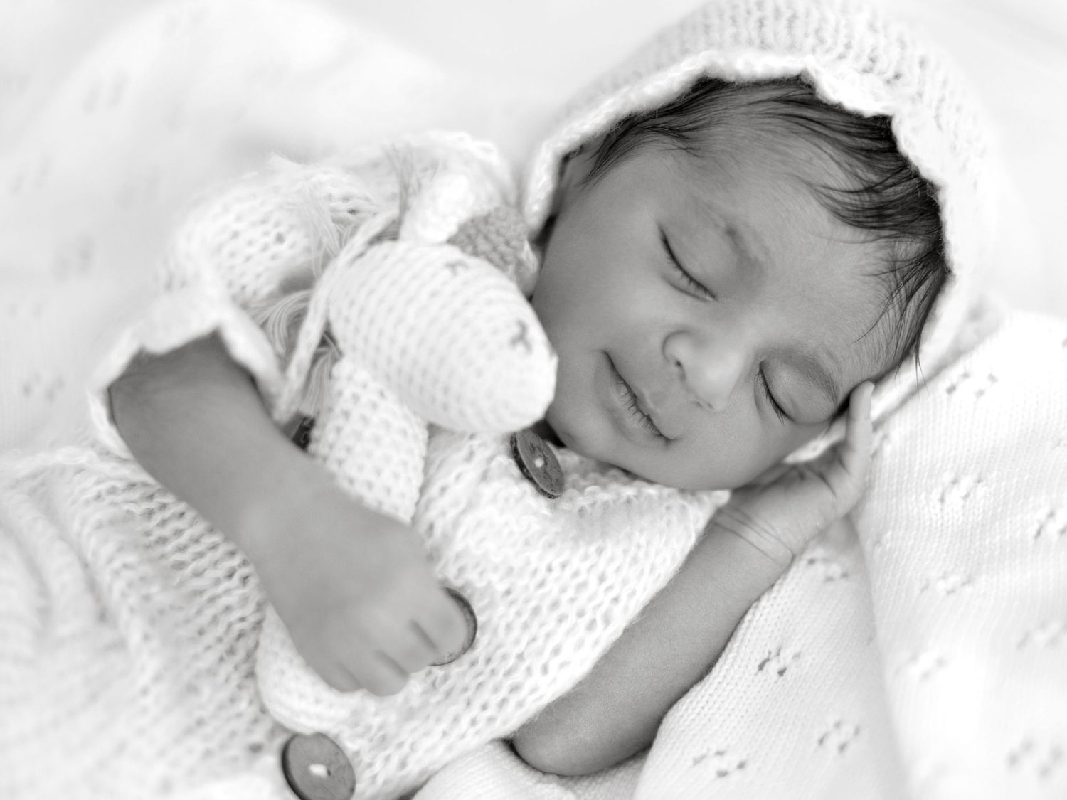 Newborn photography session capturing baby’s first moments
