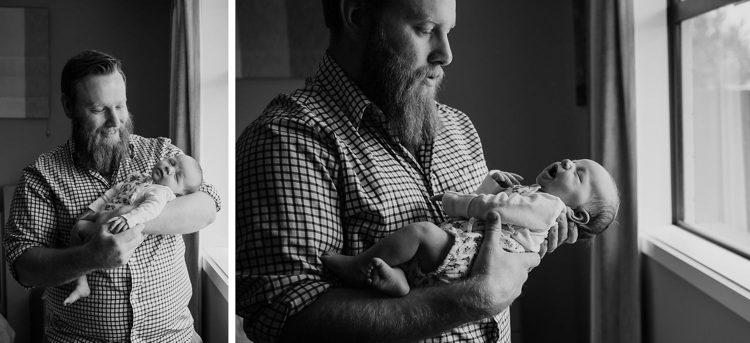 dad holding baby