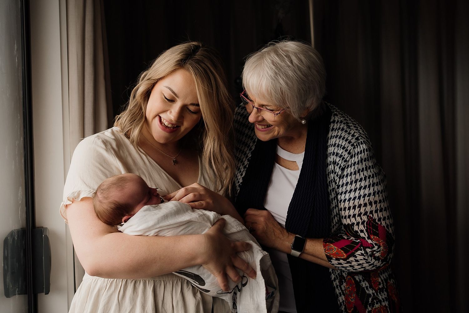 A grandma, mum and baby