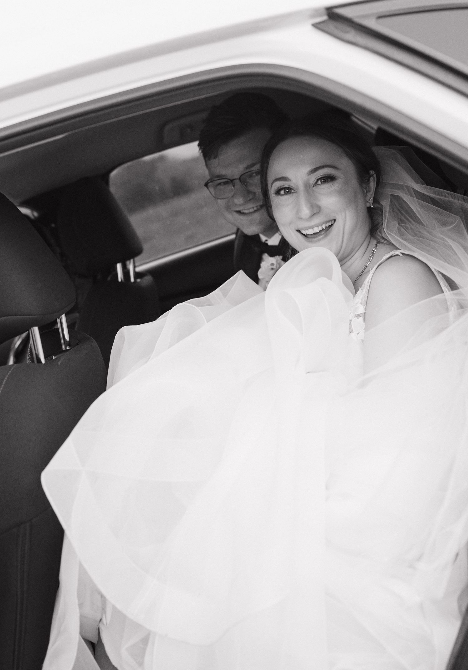 A married couple getting in the car at Elmhirst Resort, Keene