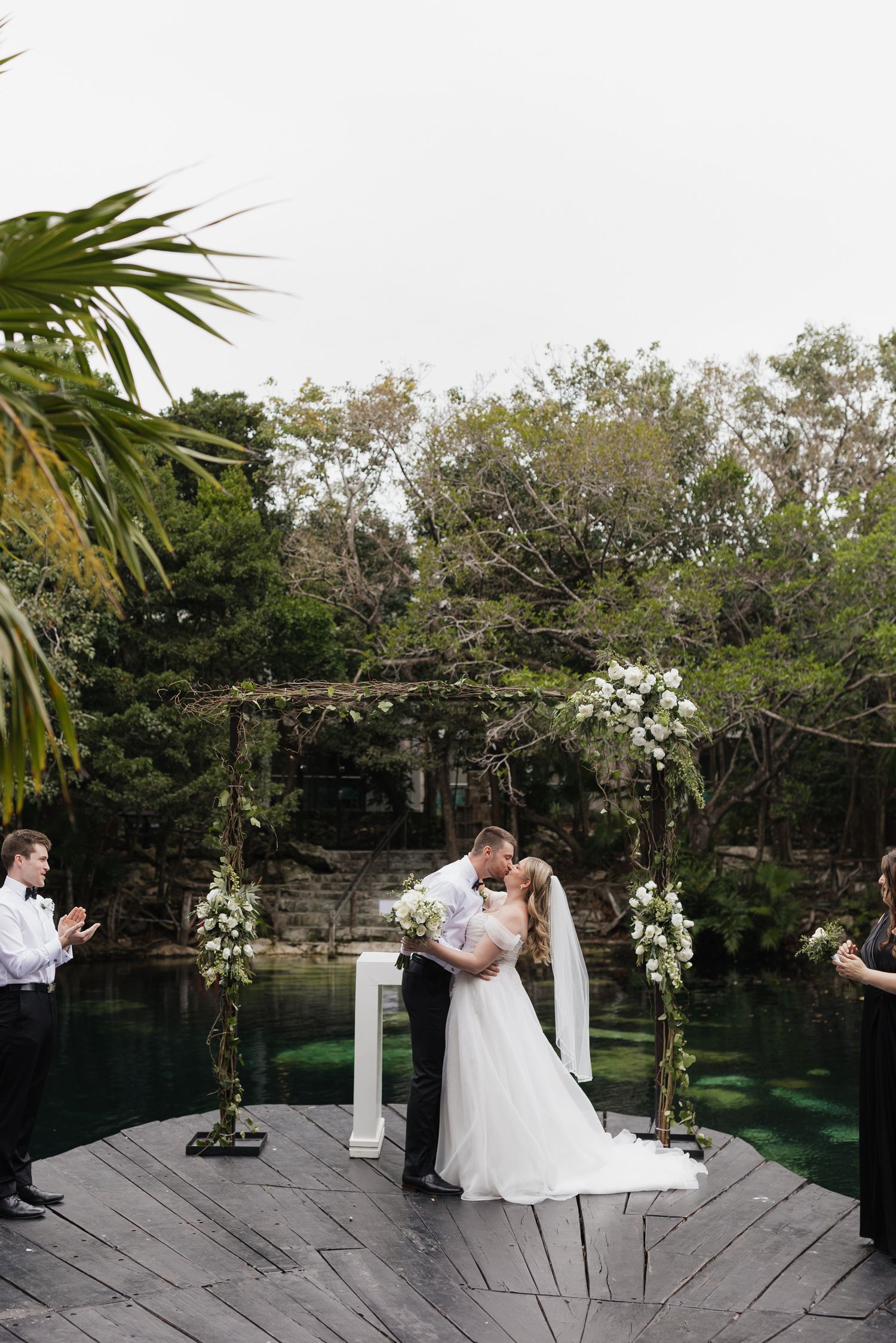 Couples first kiss portrait for a destination wedding in Mexico Sandos Eco Resort