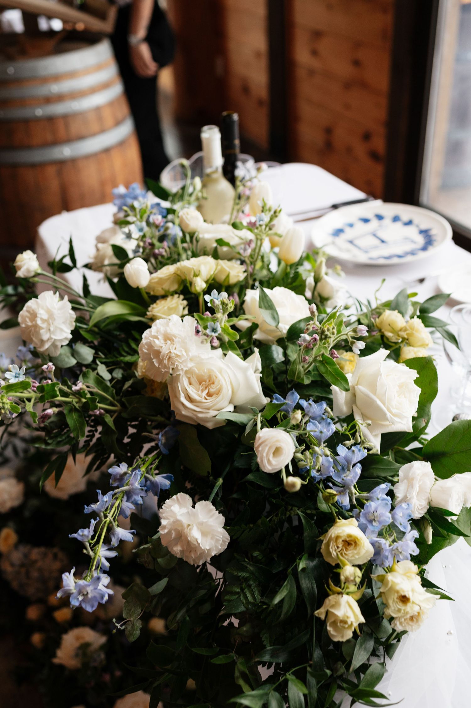Stunning florals at Candid reception moment at Holland Marsh Wineries bradford Ontario