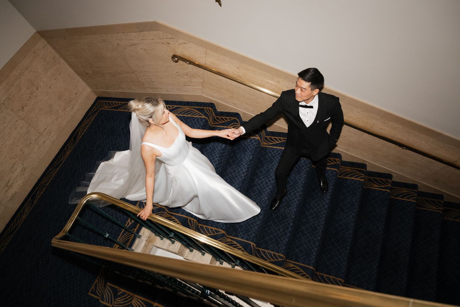 Walking down stairs at Fairmont Royal York, Toronto