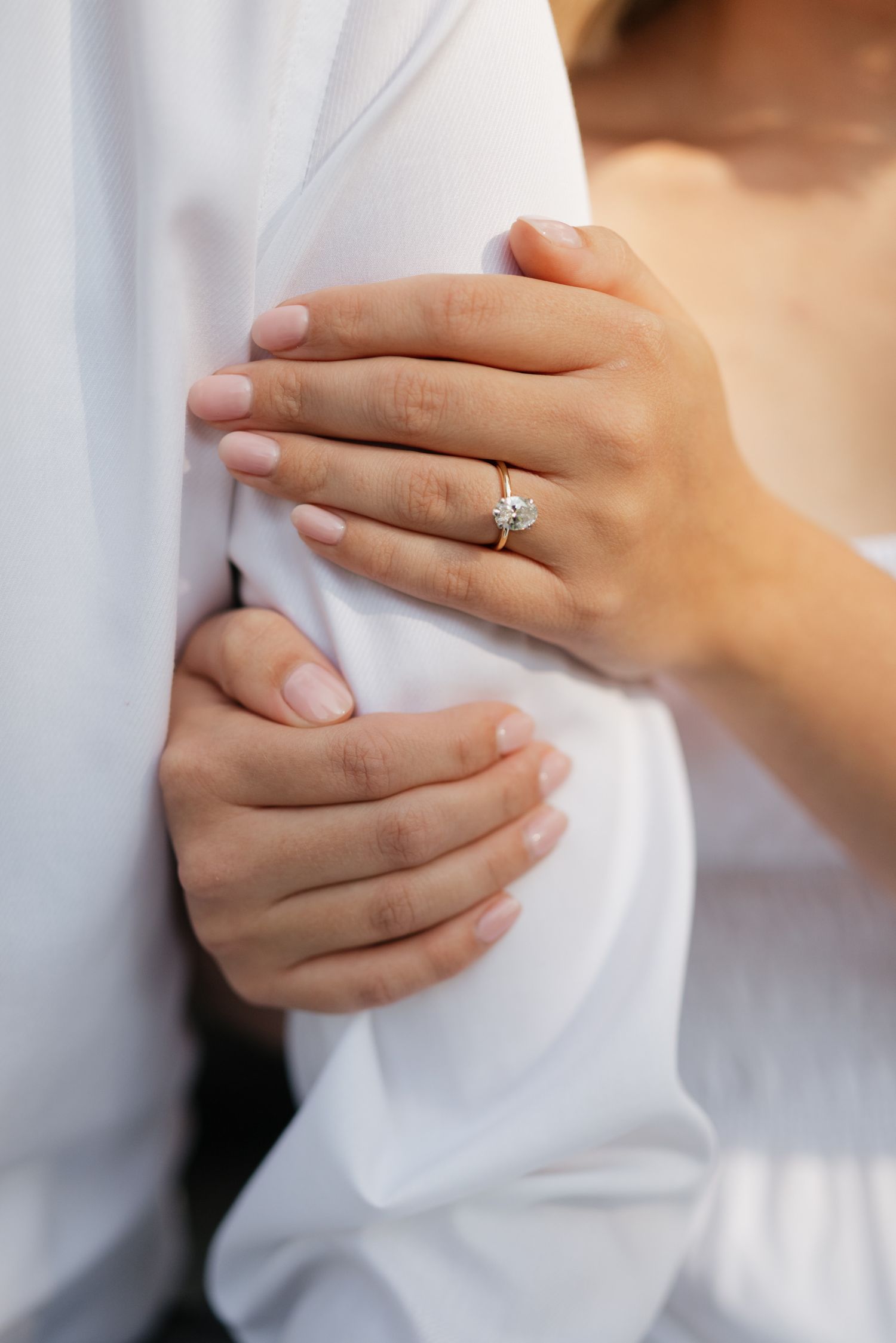 Close up photo of wedding ring during engagement shoot at Parkwood