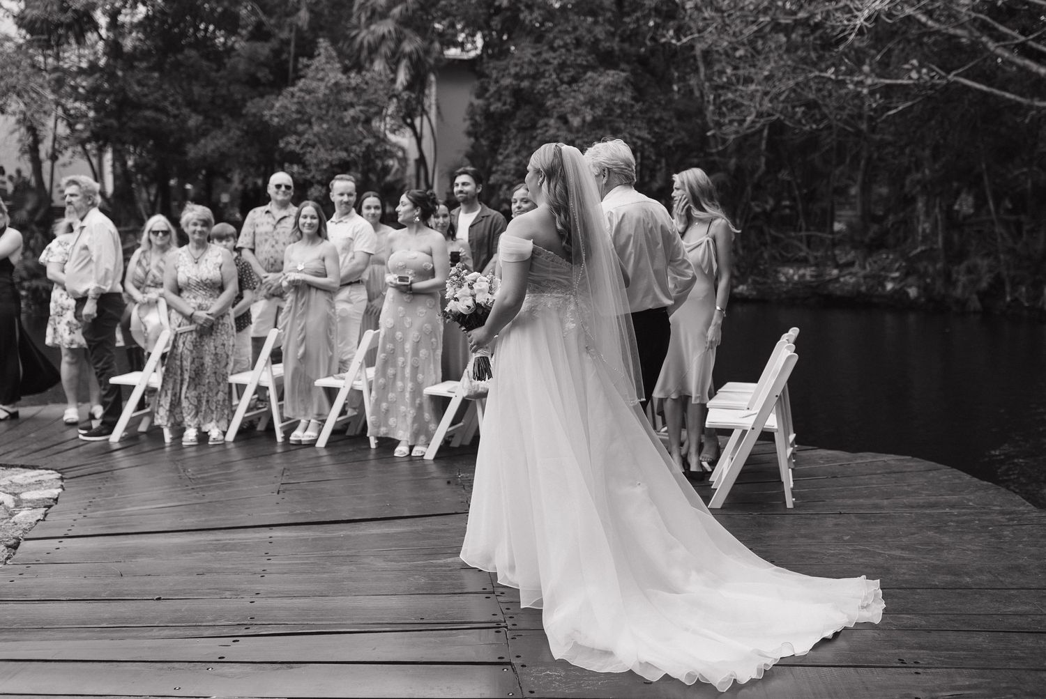 Bride walking down asiel at Sandos Caracol Eco resort Mexico